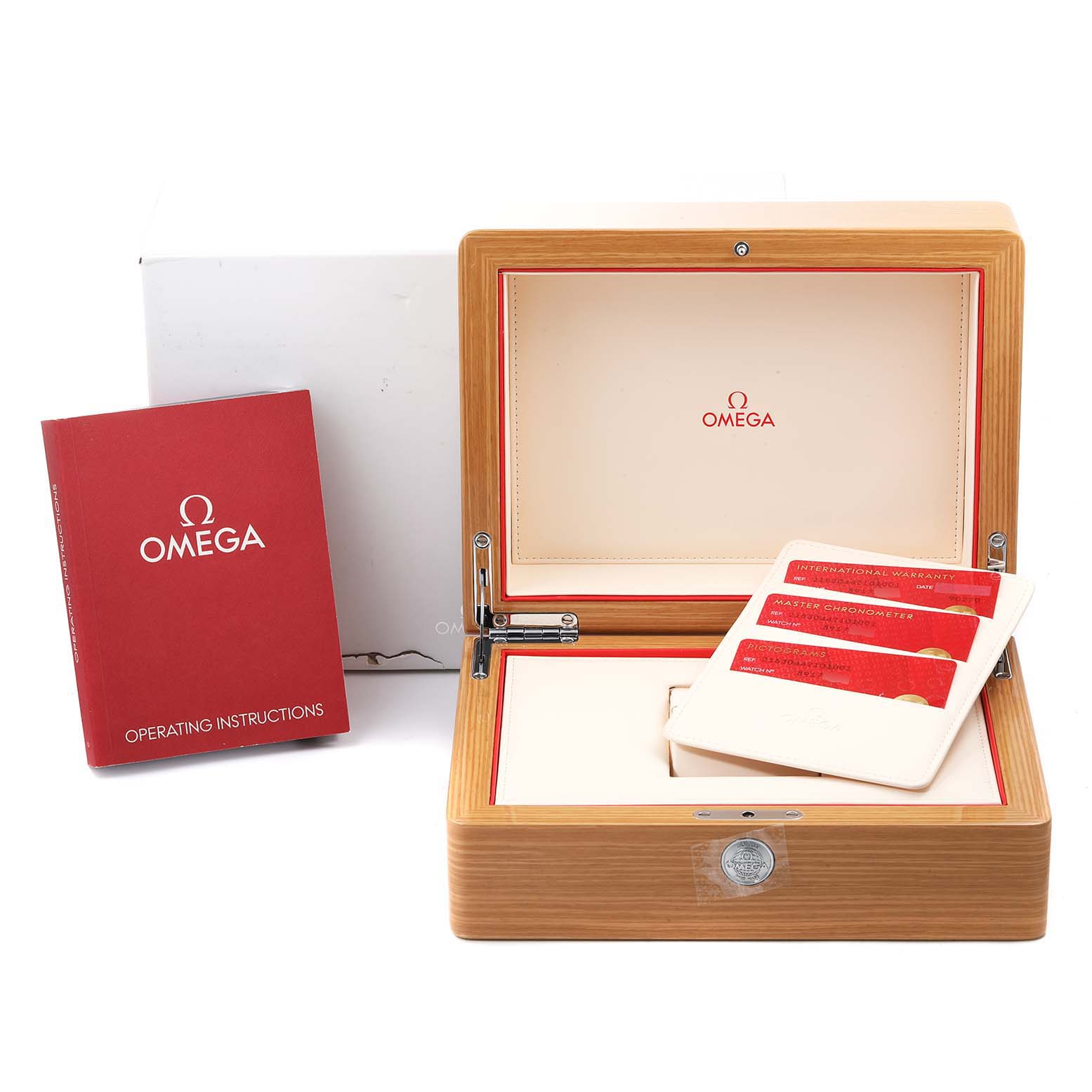 The image shows an Omega Planet Ocean 215.30.44.21.01.001 Men's Stainless Steel Black Dial 215.30.44.21.01.001 Men's Stainless Steel Black Dial watch box, operating instructions booklet, and warranty cards.