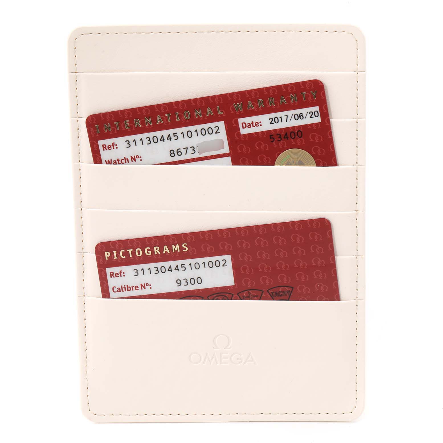 The image displays a holder with two red cards for the Omega Speedmaster 311.30.44.51.01.002 Men
s Stainless Steel Black Dial 311.30.44.51.01.002 Men
s Stainless Steel Black Dial model, depicting international warranty and pictograms.