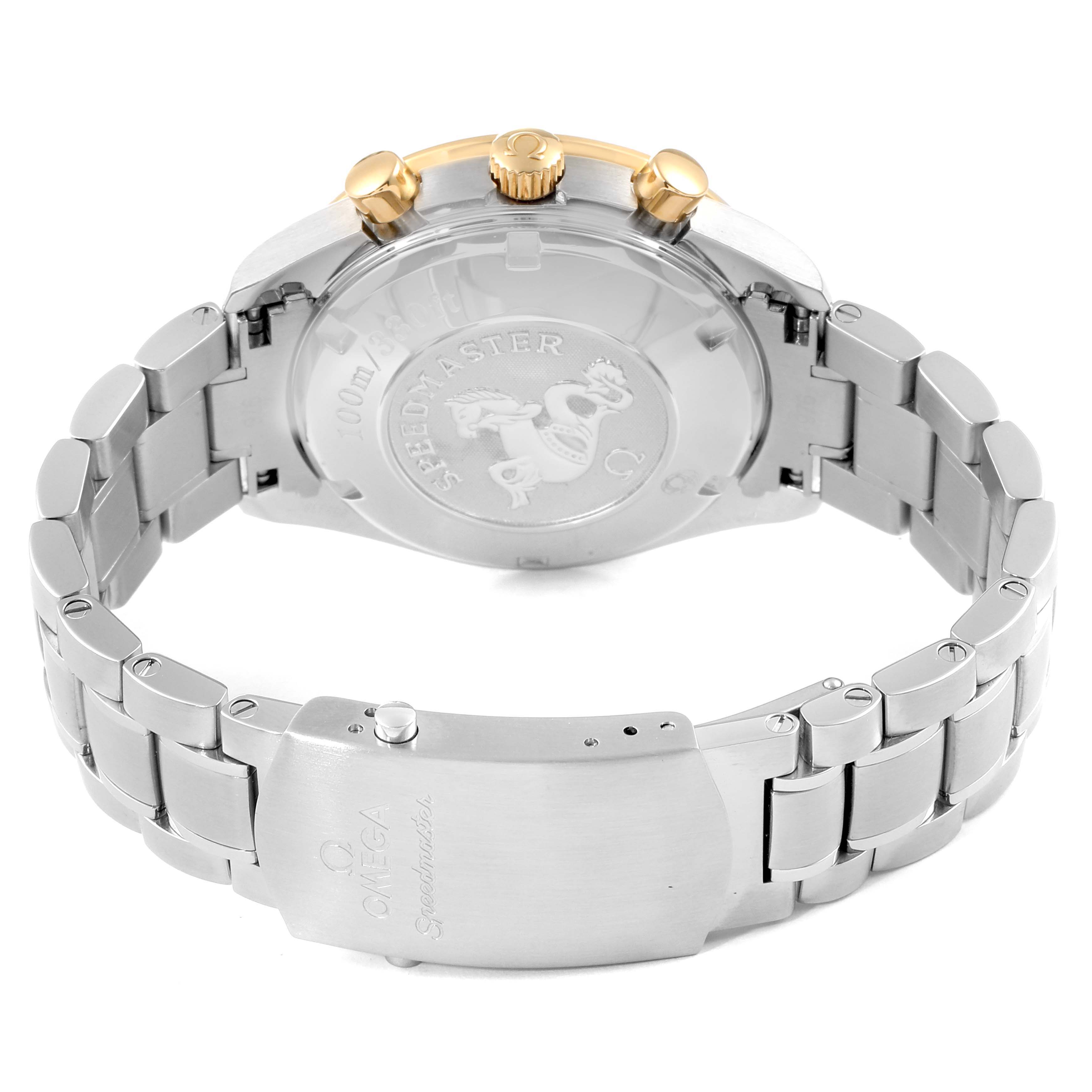 The image shows the back and bracelet of the Omega Speedmaster 323.21.40.44.02.001 Men's Steel and Gold (two tone) Silver Dial 323.21.40.44.02.001 Men's Steel and Gold (two tone) Silver Dial watch, highlighting the clasp and case back.