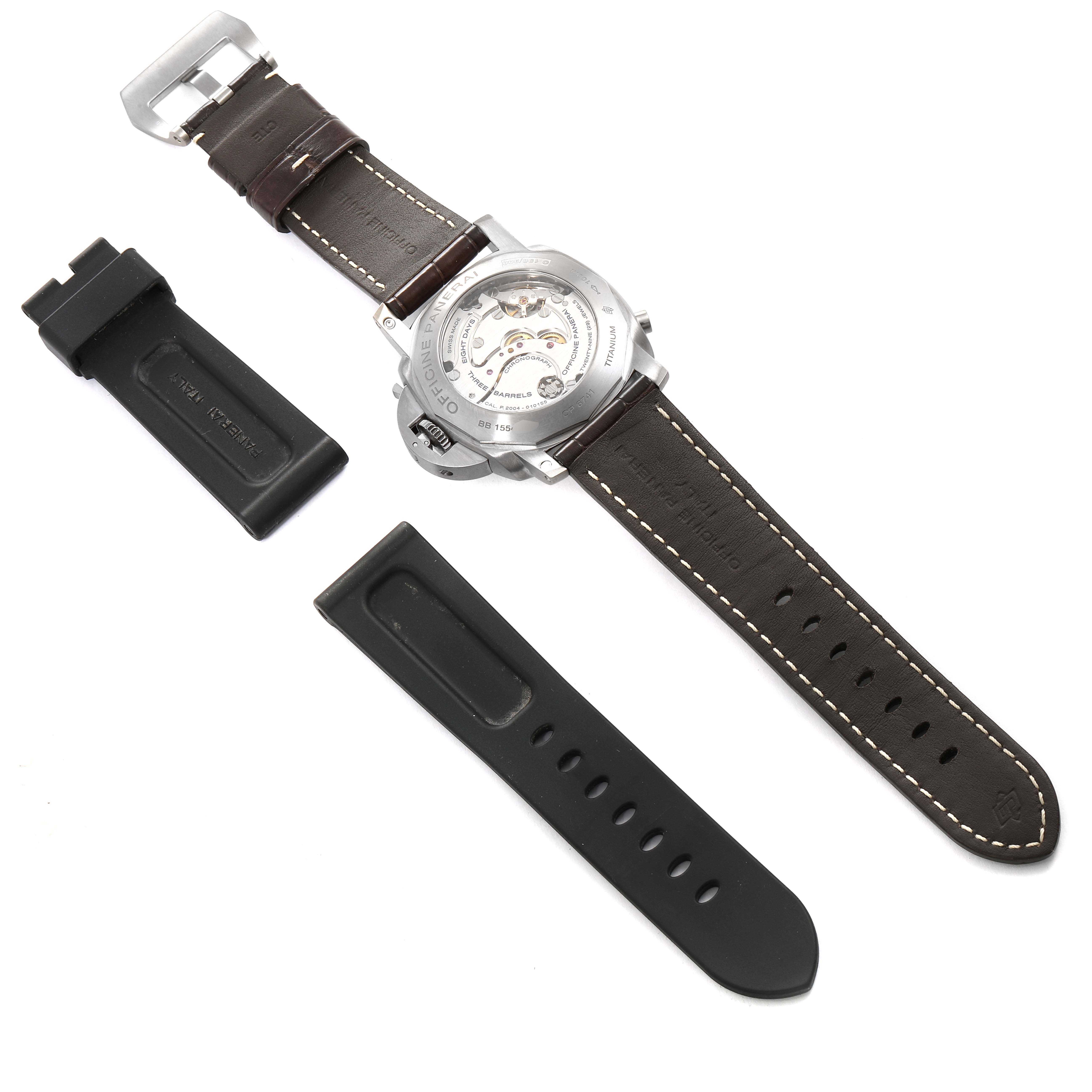 The Panerai Luminor PAM00311 Men's Titanium Black Dial PAM00311 Men's Titanium Black Dial watch is shown from the back with a brown leather strap, accompanied by two black interchangeable straps.