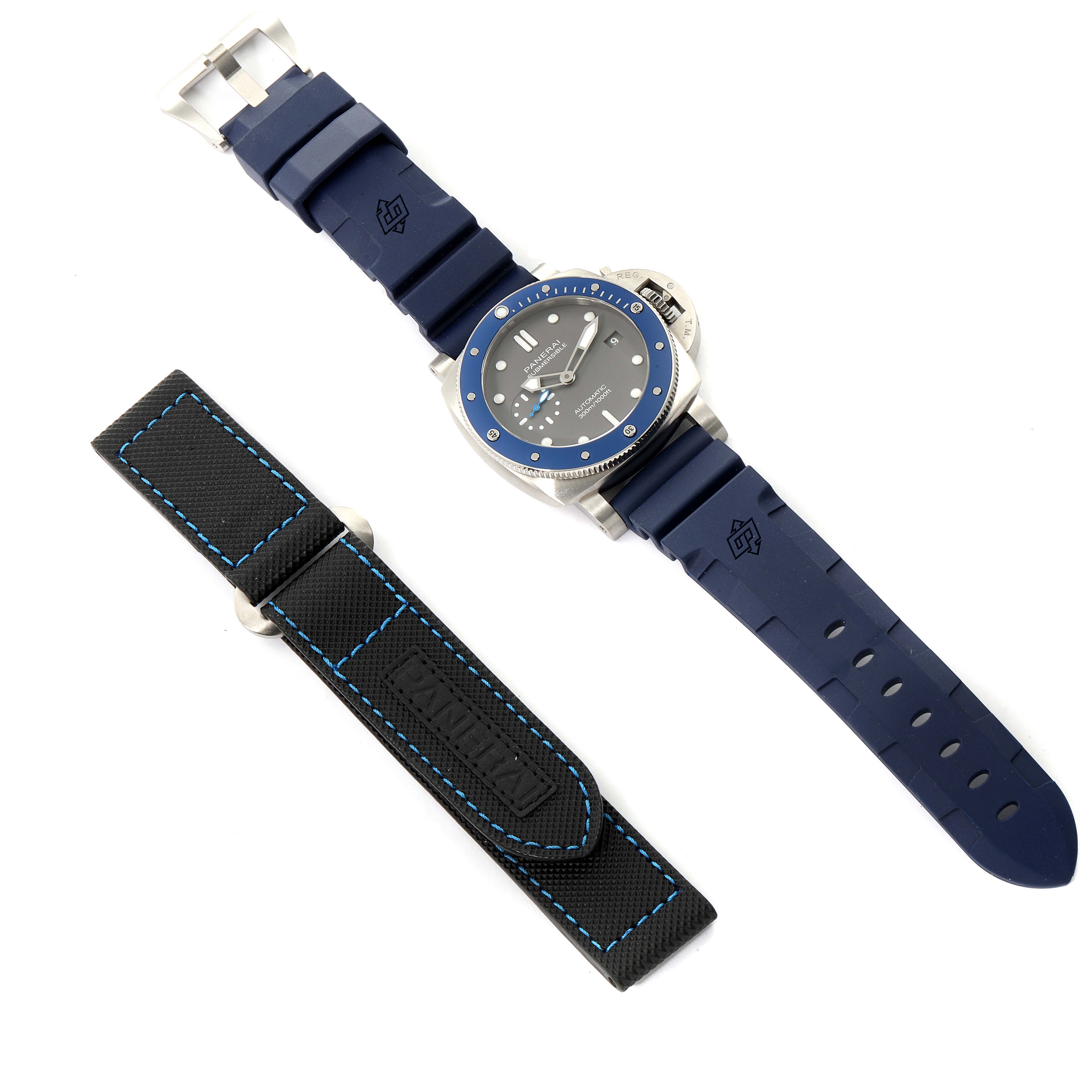 The Panerai Submersible PAM00959 Men
s Stainless Steel Grey Dial PAM00959 Men
s Stainless Steel Grey Dial model watch is shown from the front, along with a separate black strap accessory.