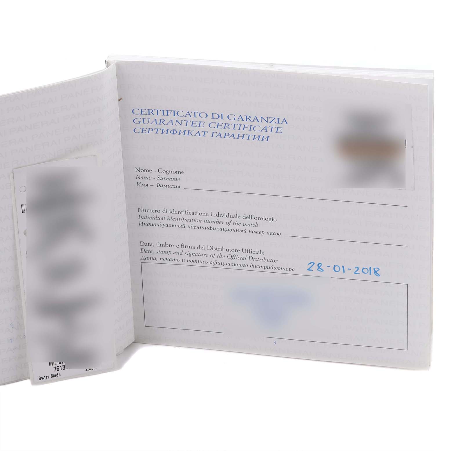 The image shows an open guarantee certificate booklet for a Panerai Radiomir PAM00610 Men's Stainless Steel Black Dial watch, displaying the inside pages and a date written in blue.