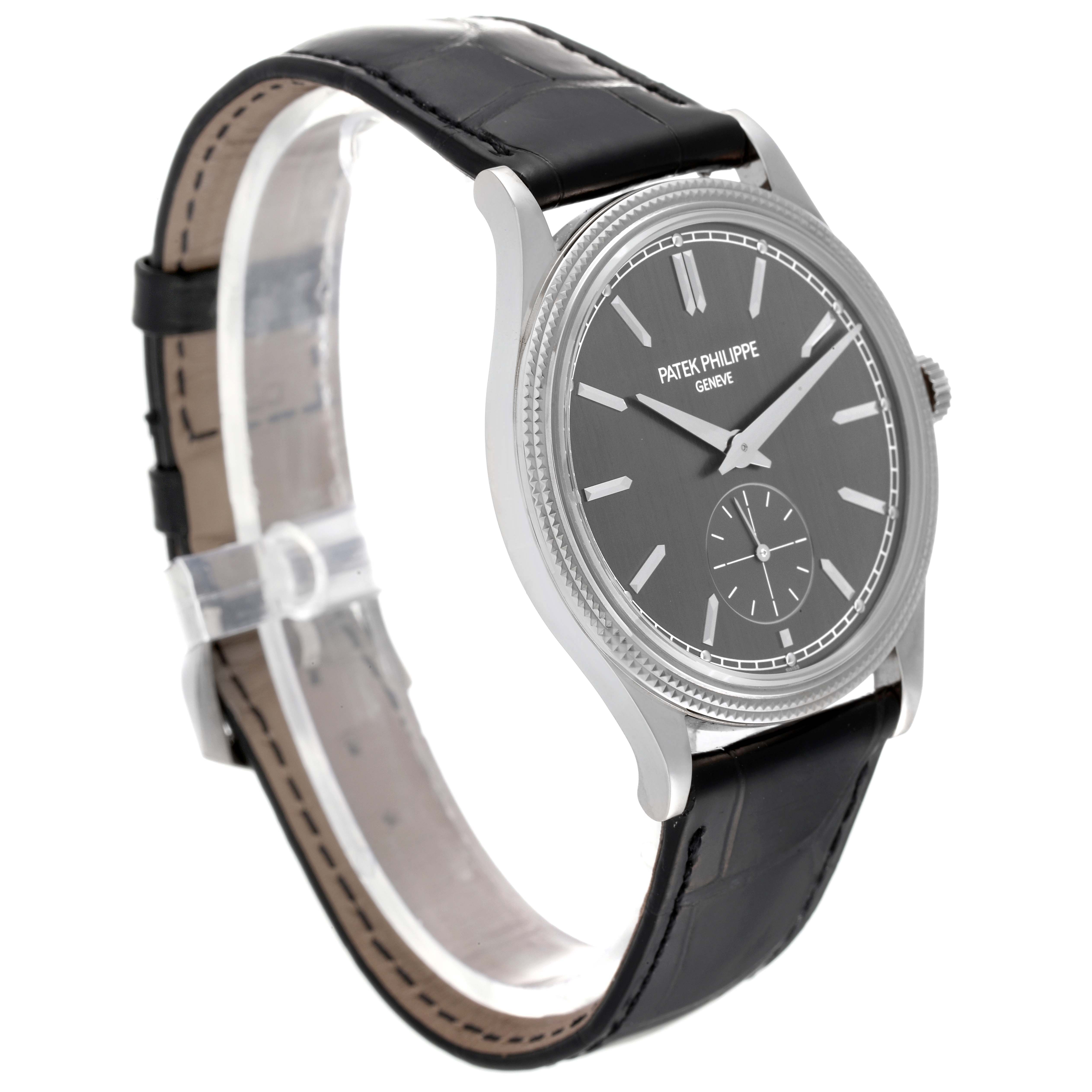 This Patek Philippe Calatrava 6119G-001 Men's White Gold Grey Dial 6119G-001 Men's White Gold Grey Dial watch is shown from a three-quarter angle, highlighting the face, bezel, case, and leather strap.