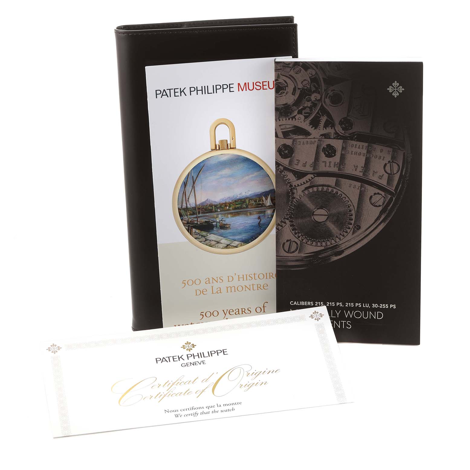 The image shows Patek Philippe Calatrava 6119G-001 Men's White Gold Grey Dial 6119G-001 Men's White Gold Grey Dial manuals and a Certificate of Origin arranged vertically and partially angled.