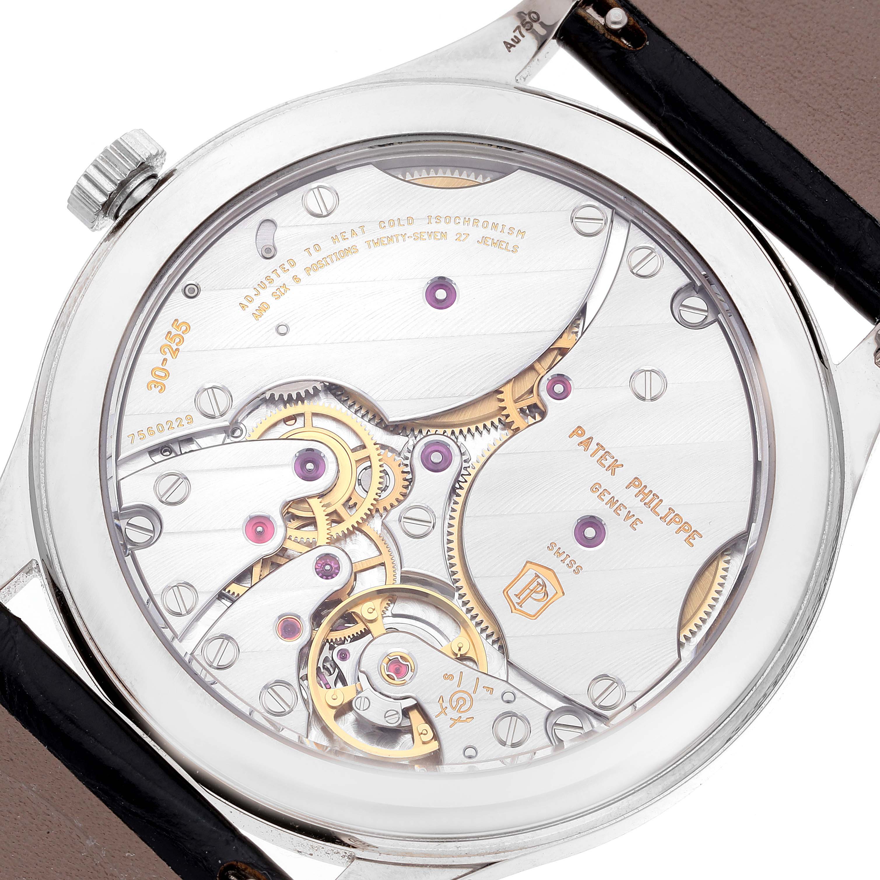 This image shows the back view of a Patek Philippe Calatrava 6119G-001 Men's White Gold Grey Dial 6119G-001 Men's White Gold Grey Dial watch, highlighting its intricate movement and mechanics.