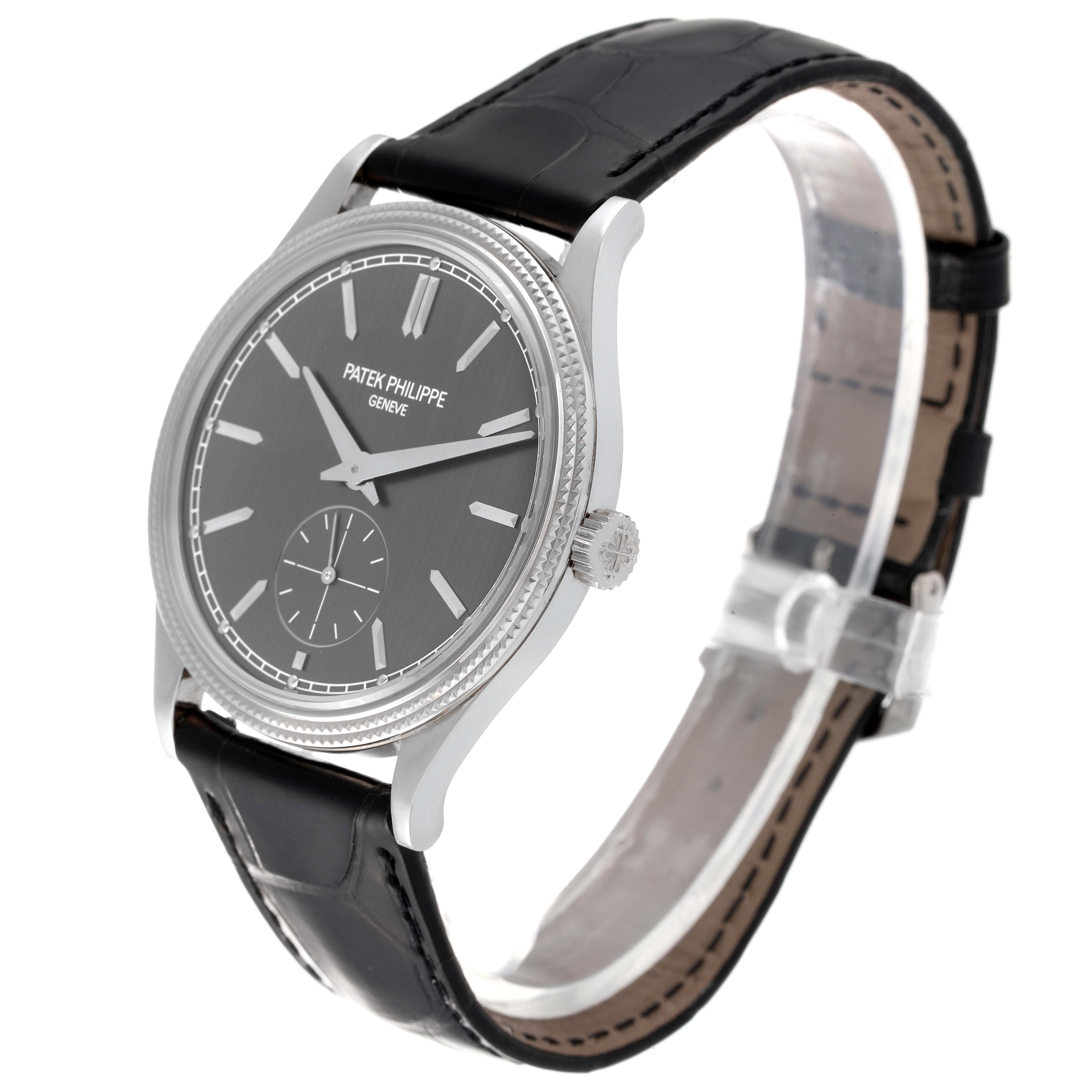 The Patek Philippe Calatrava 6119G-001 Men's White Gold Grey Dial 6119G-001 Men's White Gold Grey Dial watch is shown at a slight angle, displaying the face, crown, and black leather strap.