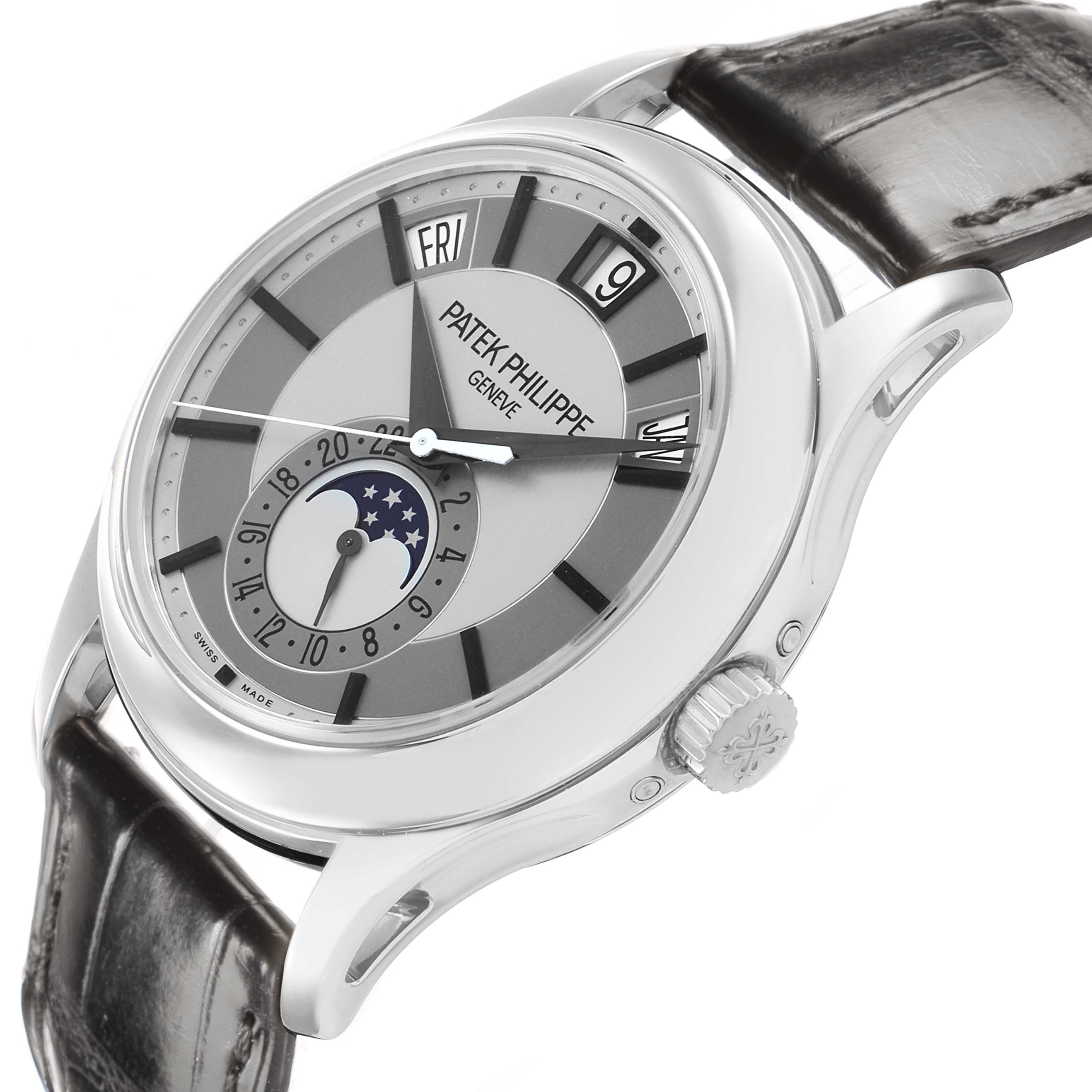 The Patek Philippe Complications 5205G Men's White Gold Silver Dial watch is shown from a front-side angle, highlighting the dial, crown, and leather strap.