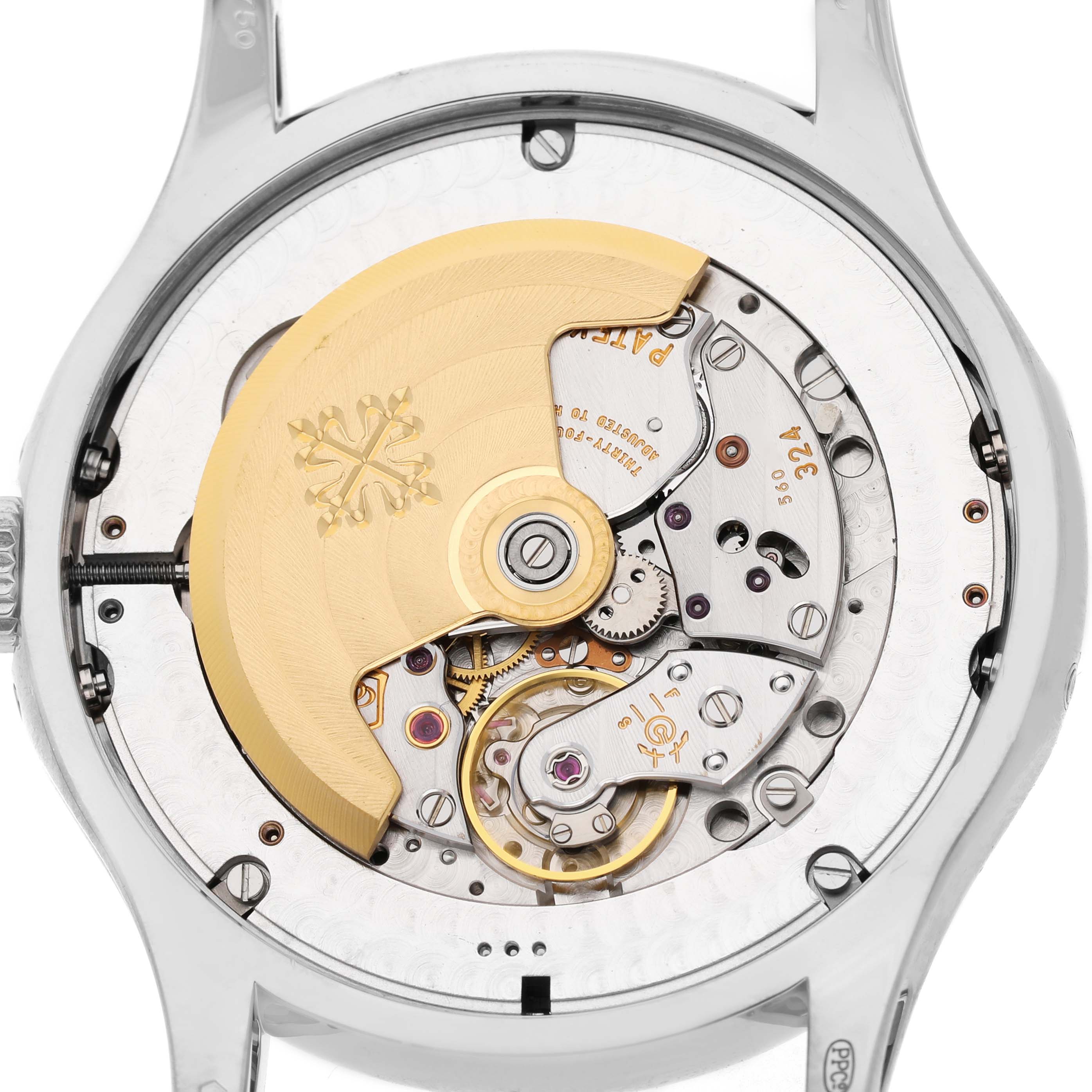 The image shows the movement from the back of the Patek Philippe Complications 5205G Men's White Gold Silver Dial watch, highlighting its intricate mechanics.