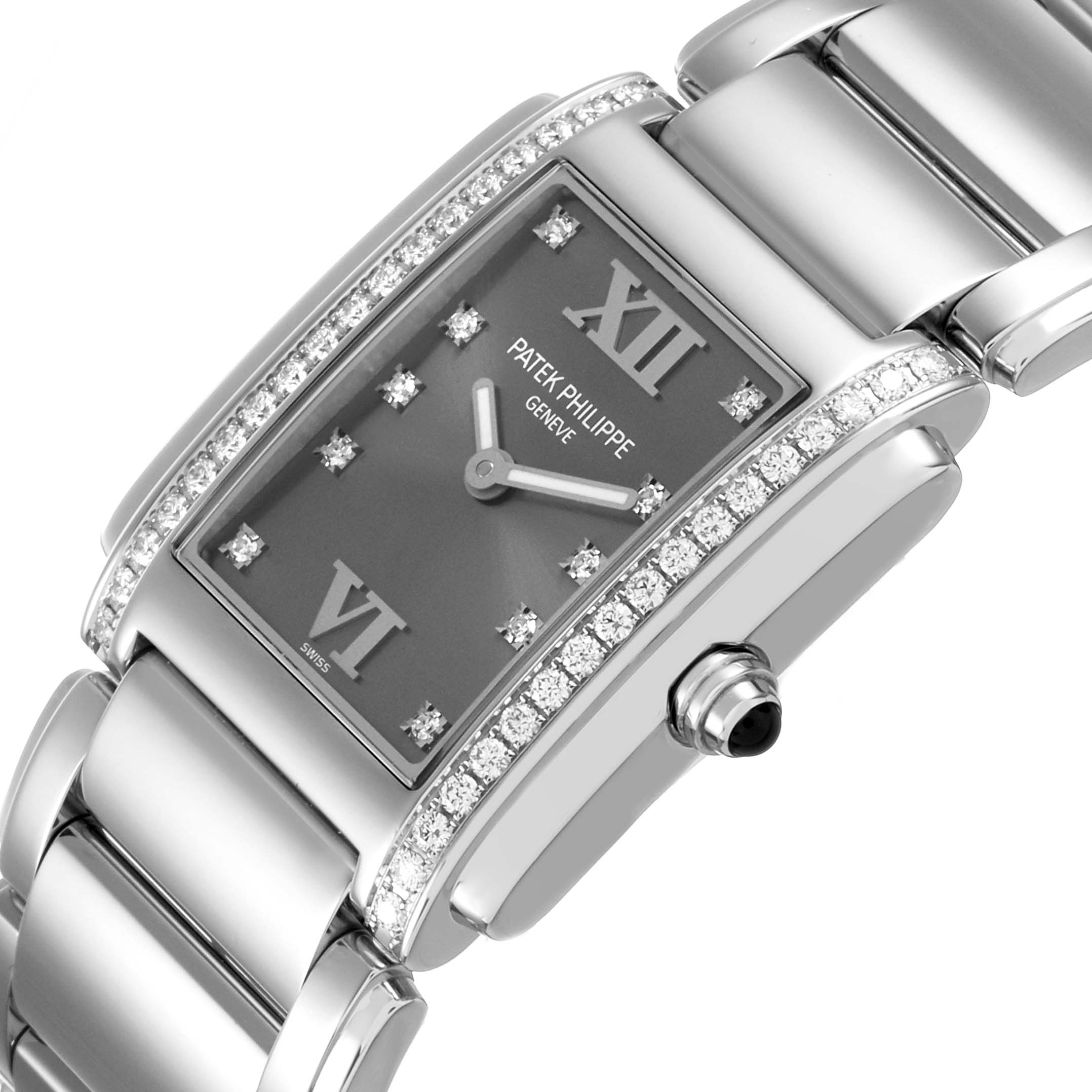 The Patek Philippe Twenty-4 4910/10A-010 Women's Stainless Steel Grey Dial watch is shown at an angled side view, highlighting its rectangular face, diamond bezel, and metal bracelet.