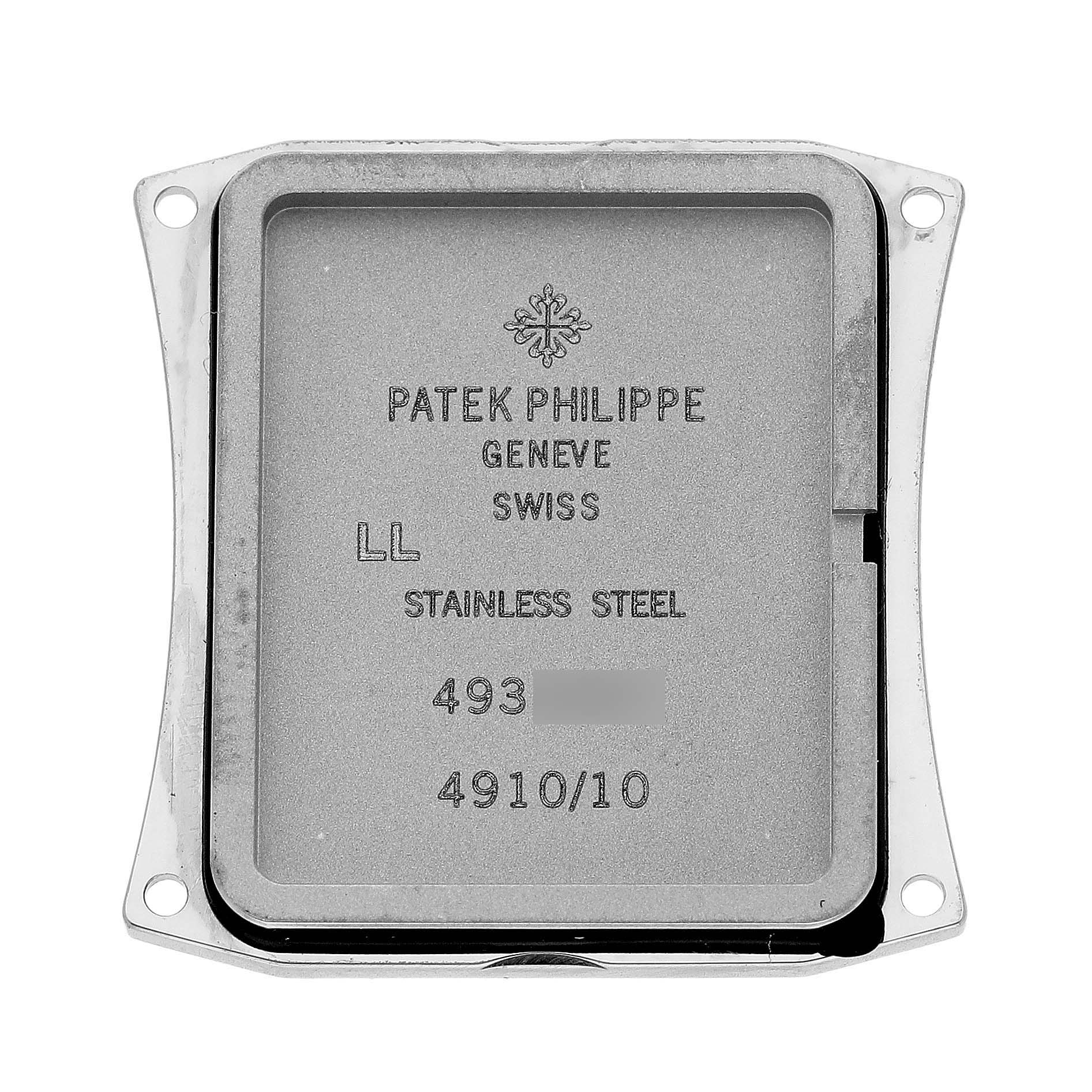 The image shows the back case of a Patek Philippe Twenty-4 4910/10A-010 Women's Stainless Steel Grey Dial model, featuring engravings and material details.