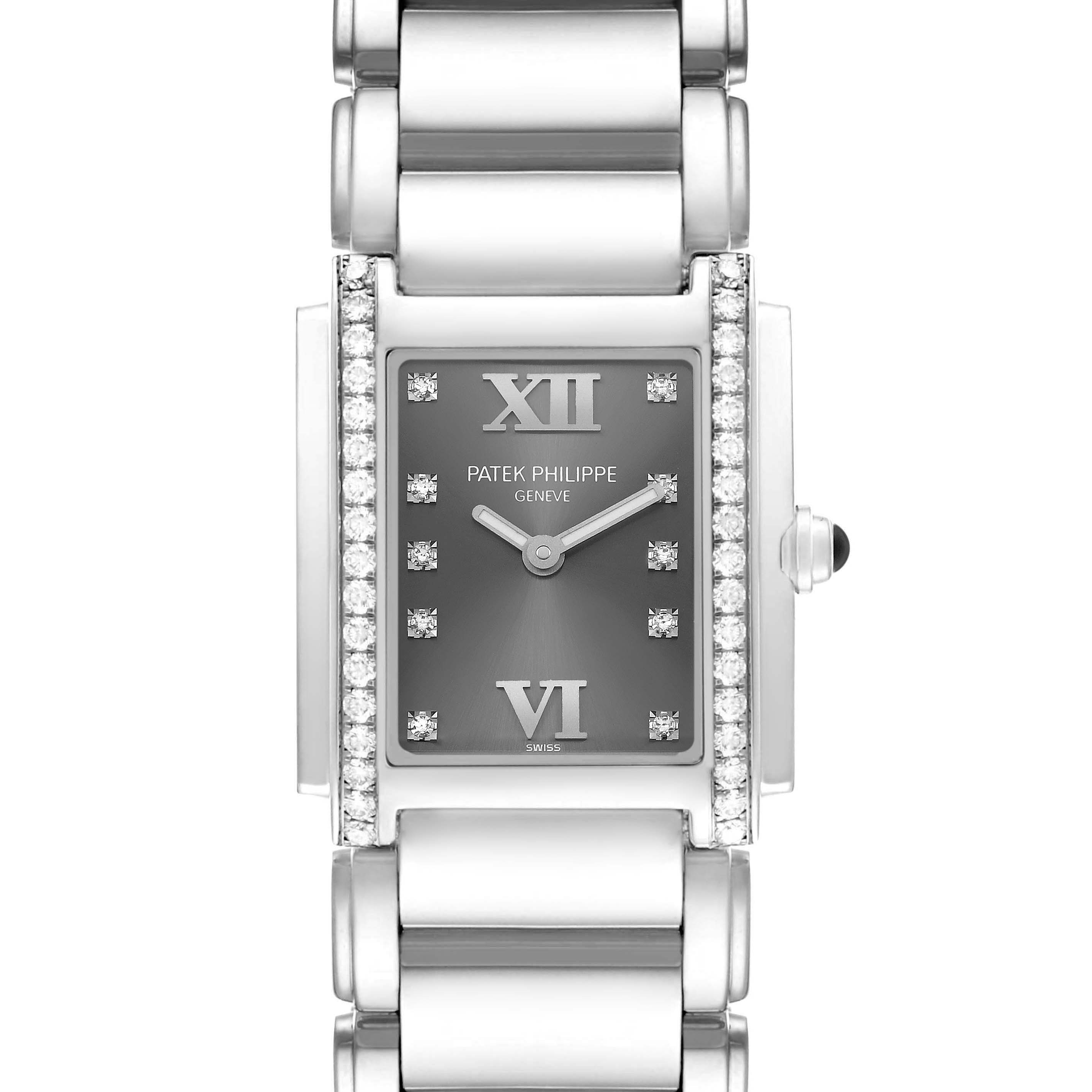 The Patek Philippe Twenty-4 4910/10A-010 Women's Stainless Steel Grey Dial watch is shown from a top view, displaying its face, bracelet, and diamond-accented bezel.