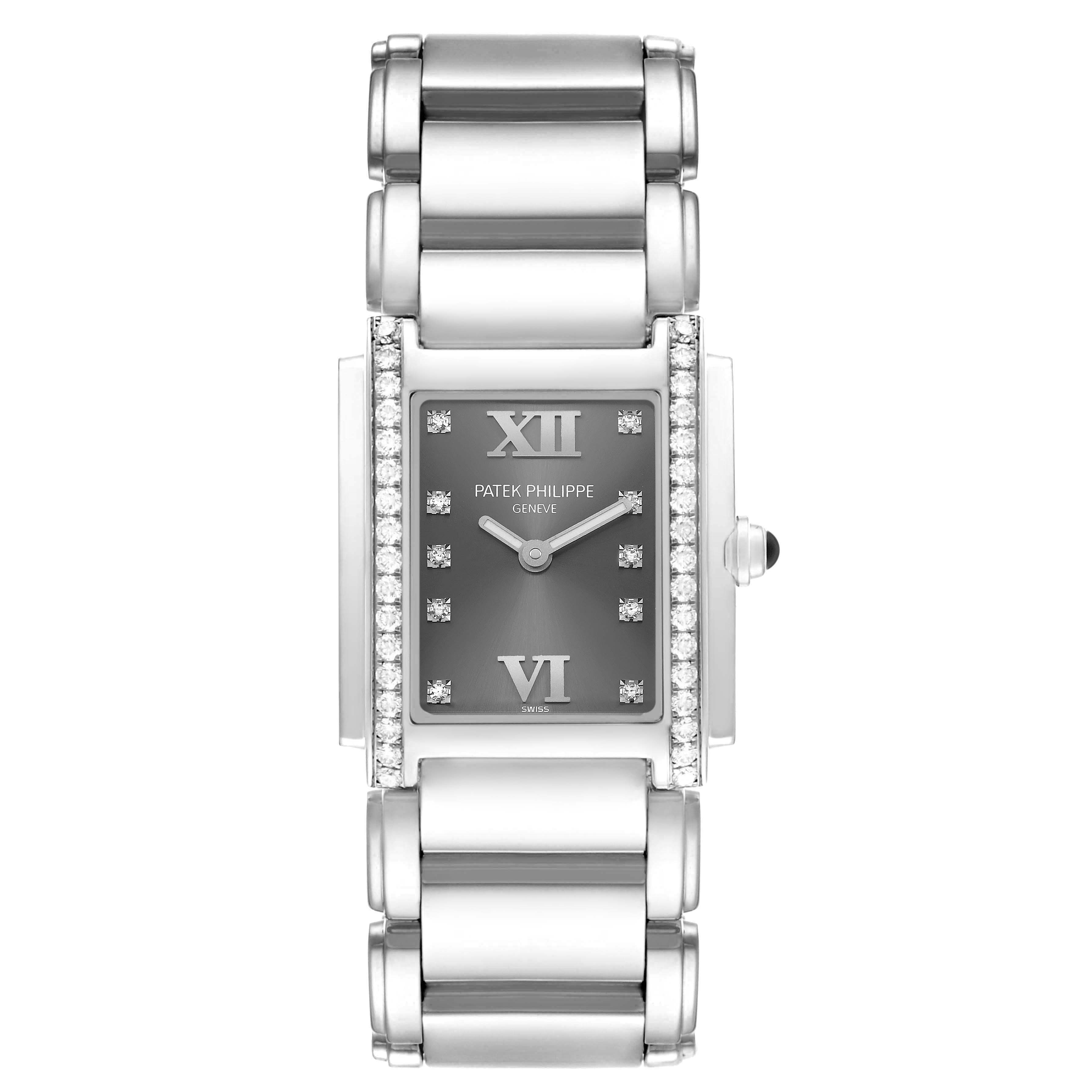 The Patek Philippe Twenty-4 4910/10A-010 Women's Stainless Steel Grey Dial watch is shown from a top view, highlighting its rectangular face, diamond markers, and bracelet.