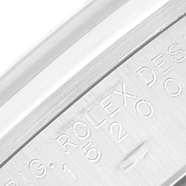 This close-up image shows the engraved details on the inner bezel of the Rolex Date 15200 Men's Stainless Steel Silver Dial 15200 Men's Stainless Steel Silver Dial model watch.