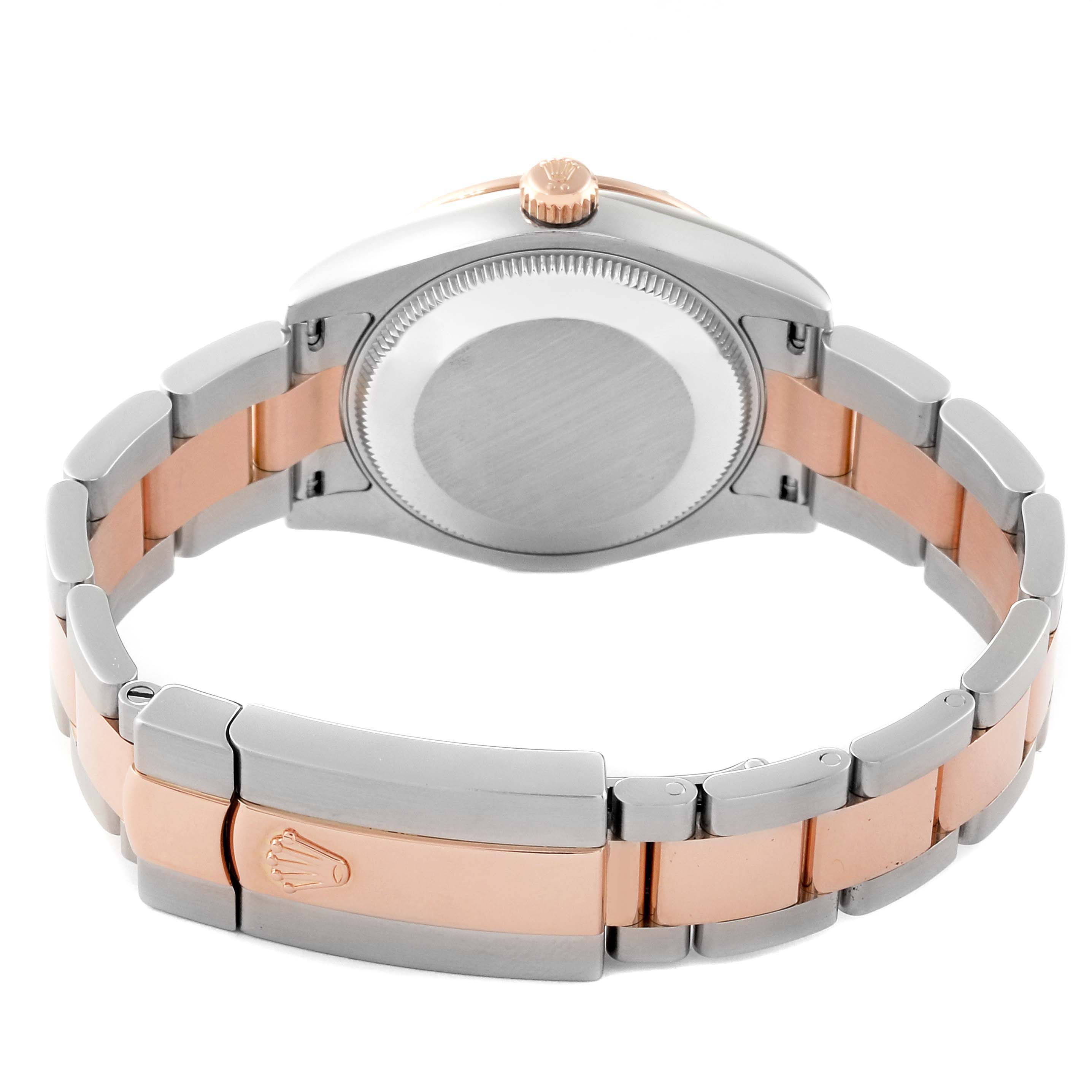 The image shows the backside and bracelet of a Rolex Mid-Size 178341 Women's Steel and Gold (two tone) Mother of Pearl Dial 178341 Women's Steel and Gold (two tone) Mother of Pearl Dial watch, highlighting its dual-tone metal links and clasp.