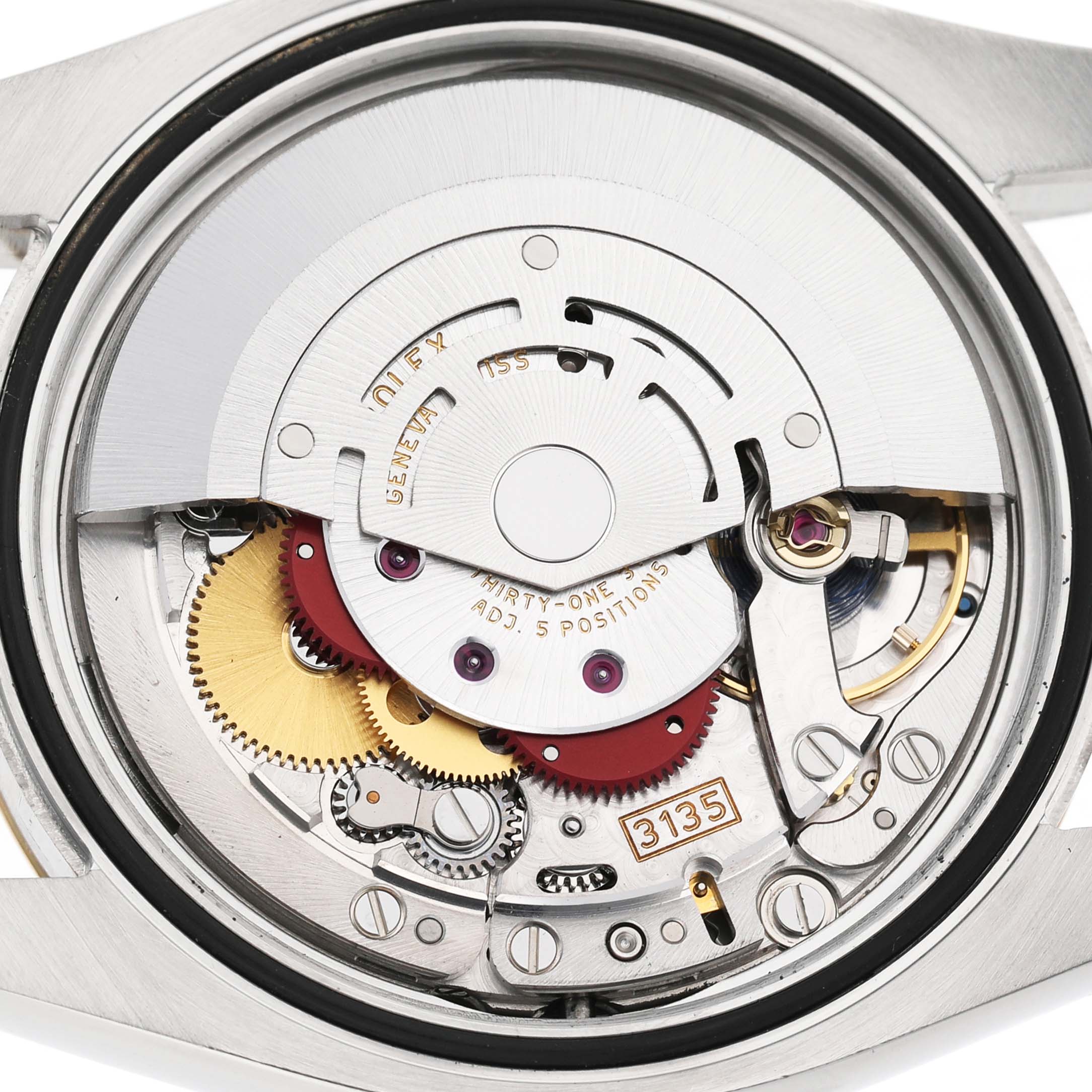 The image shows the movement and internal mechanisms of a Rolex Datejust 116233 Men's Steel and Gold (two tone) White Dial watch from the back.