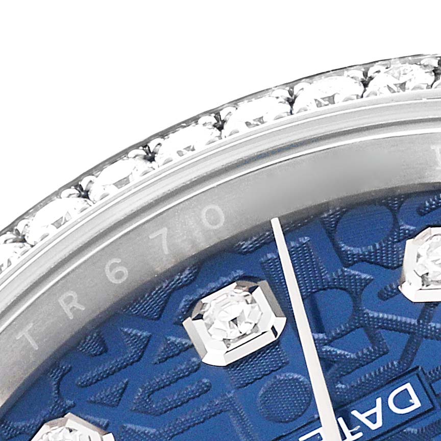This close-up angle shows the bezel, partial dial, and diamond markers of the Rolex Datejust 126284RBR Men's Stainless Steel Blue Dial 126284RBR Men's Stainless Steel Blue Dial watch.
