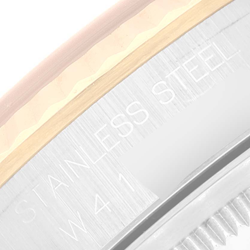 The image shows a close-up of the side and edge of the bezel on a Rolex Datejust 16233 Men's Steel and Gold (two tone) Black Dial 16233 Men's Steel and Gold (two tone) Black Dial, highlighting the stainless steel and gold components.