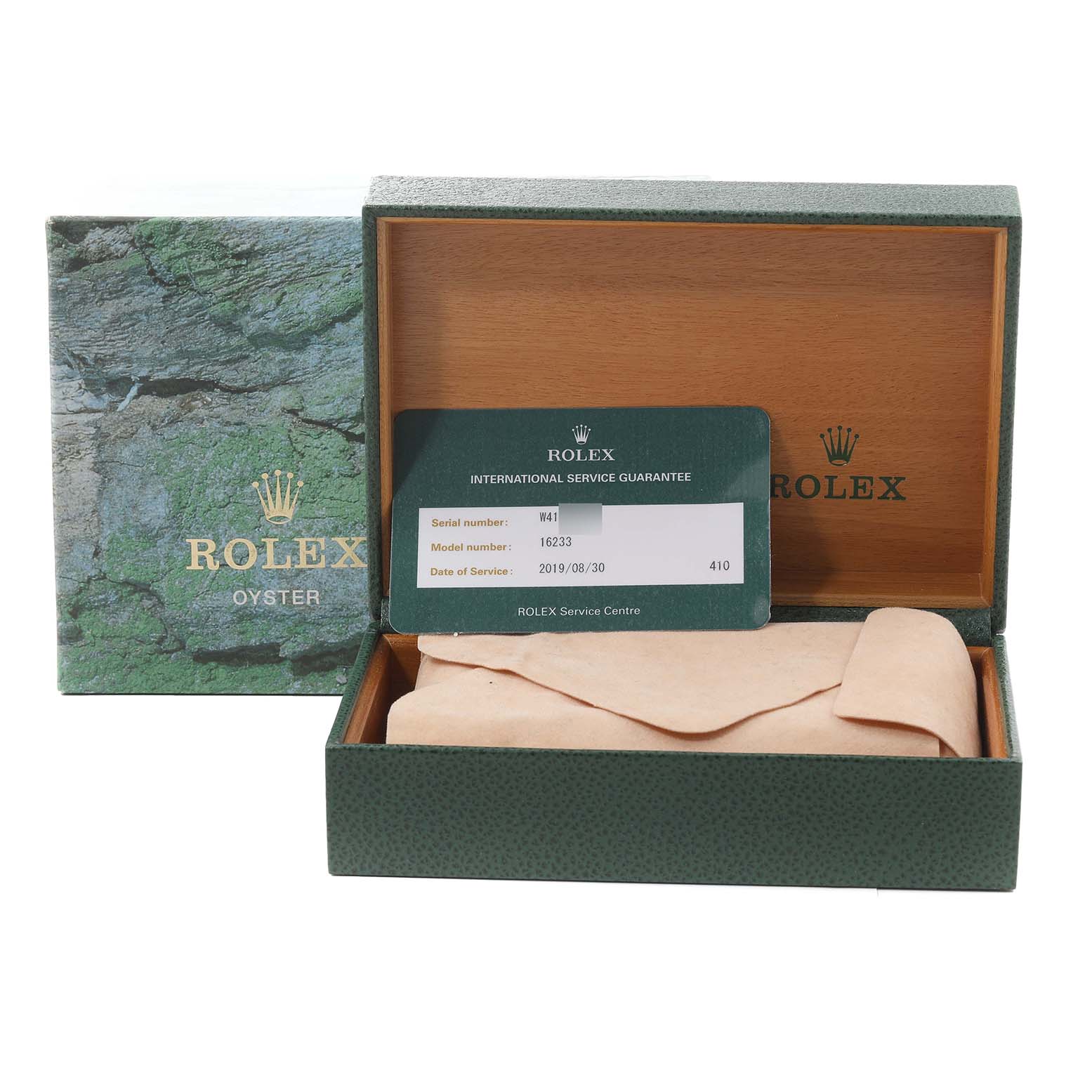 The image shows a Rolex Datejust 16233 Men's Steel and Gold (two tone) Black Dial 16233 Men's Steel and Gold (two tone) Black Dial watch box and papers including an international service guarantee card from a front angle.