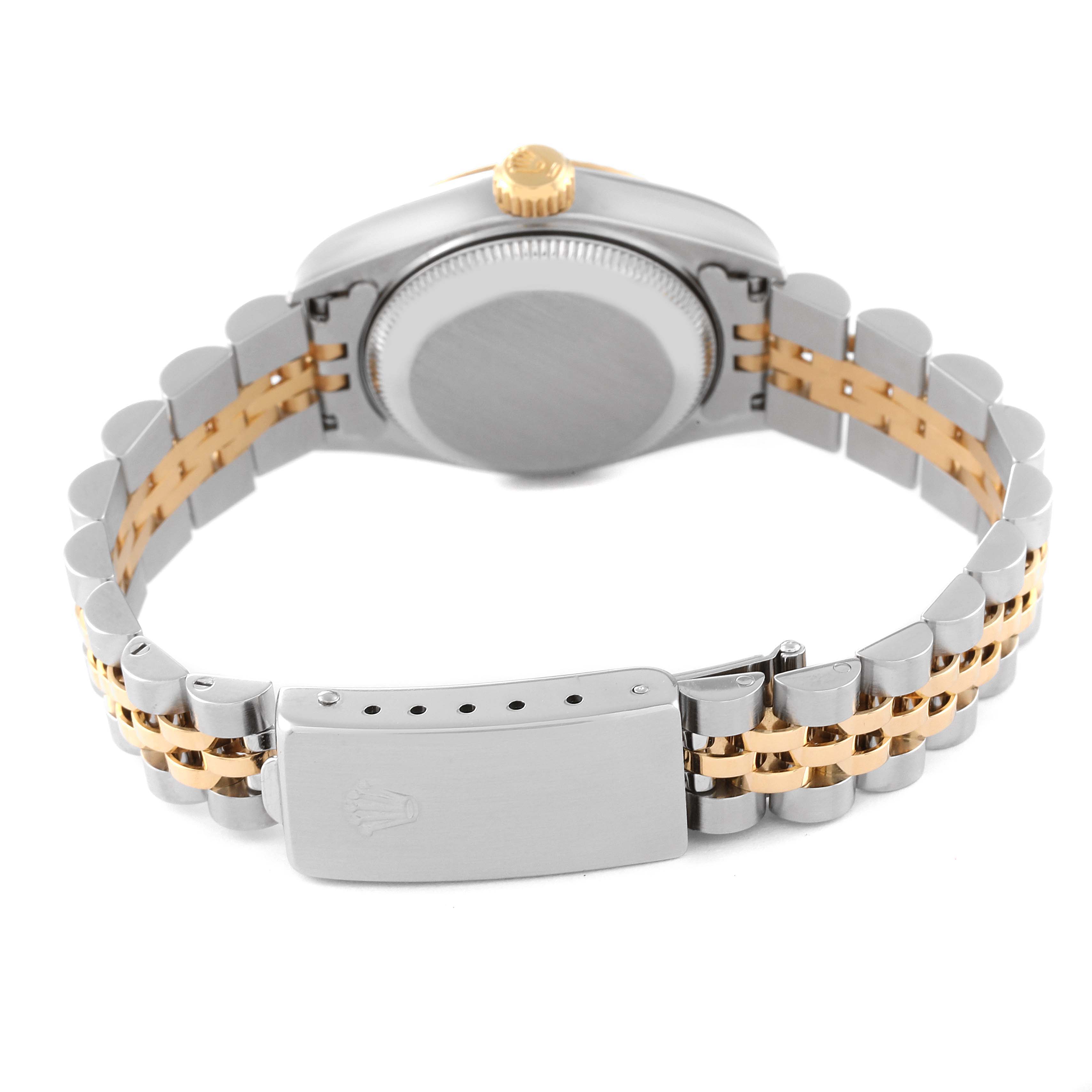 This image shows the rear view of a Rolex Datejust 69173 Women's Steel and Gold (two tone) Champagne Dial 69173 Women's Steel and Gold (two tone) Champagne Dial watch, focusing on its case back, crown, and two-tone bracelet with clasp.