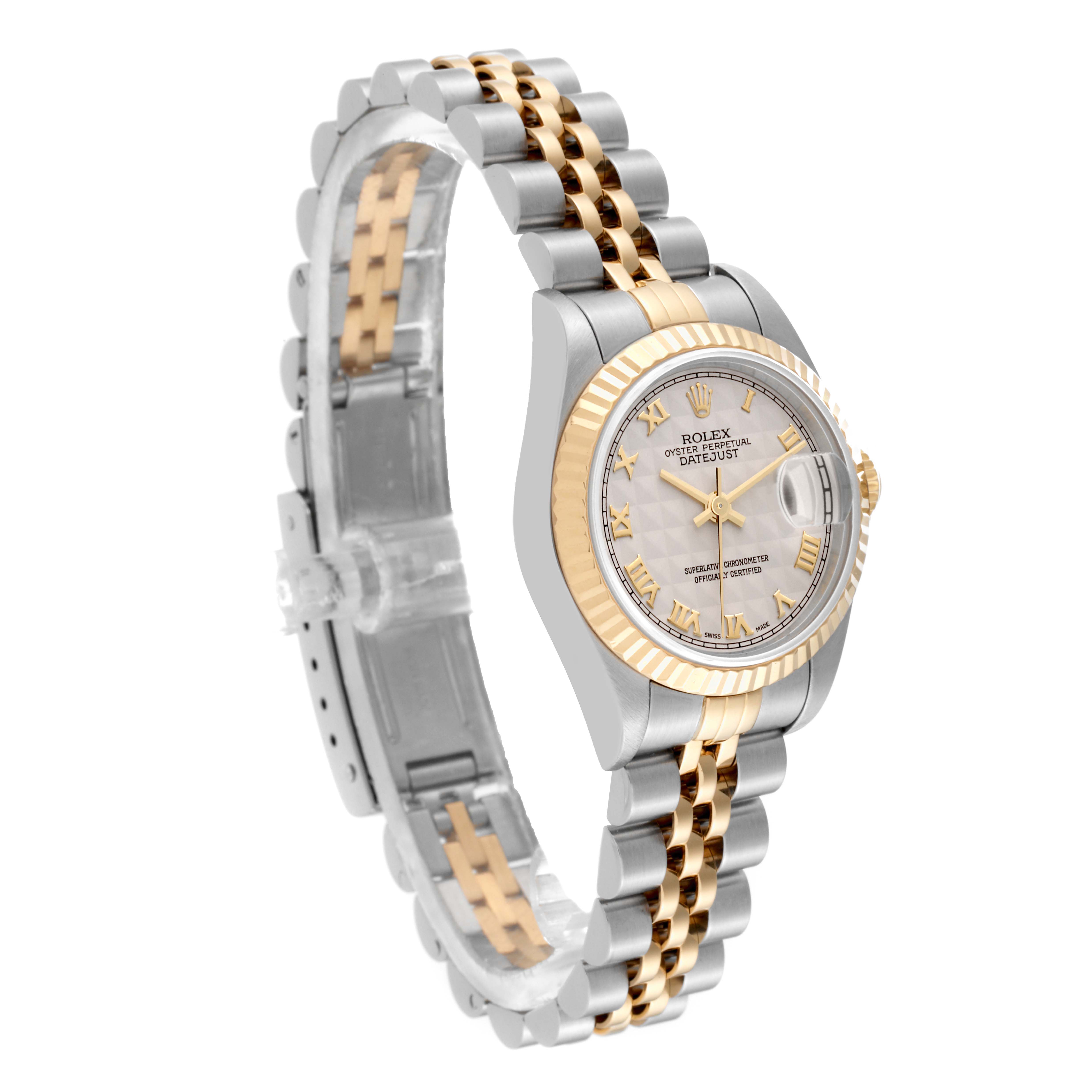 The image shows a side angle of a Rolex Datejust 79173 Women's Steel and Gold (two tone) White Dial 79173 Women's Steel and Gold (two tone) White Dial watch, highlighting its two-tone bracelet and fluted bezel.