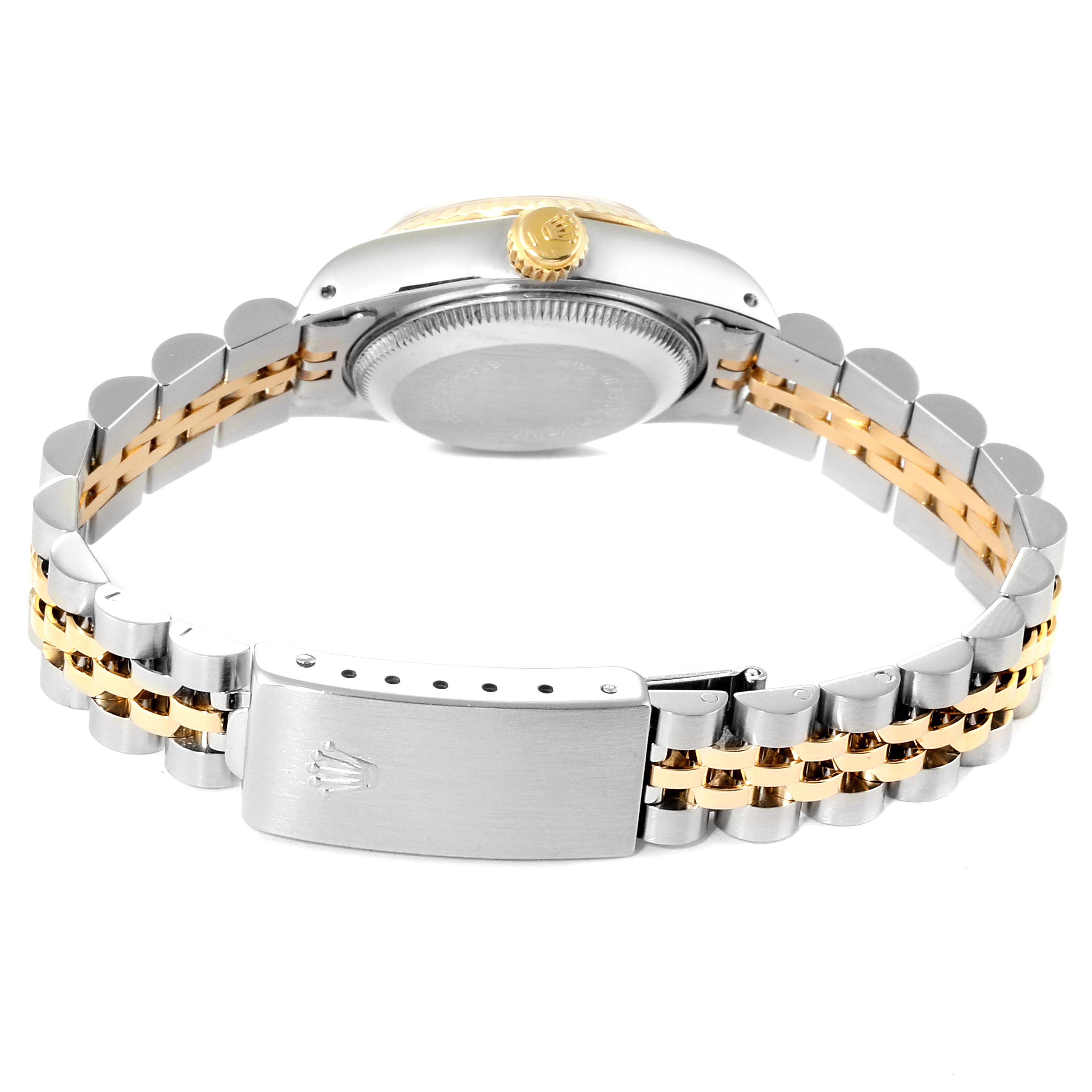 The image shows the back and bracelet of the Rolex Datejust 69173 Women
s Steel and Gold (two tone) White Dial 69173 Women
s Steel and Gold (two tone) White Dial watch, highlighting the clasp and crown.