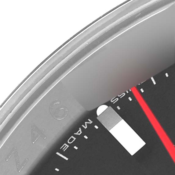 This image shows a close-up of a portion of the dial and bezel of a Rolex Turn-o-Graph 116264 Men's Stainless Steel Black Dial 116264 Men's Stainless Steel Black Dial watch.