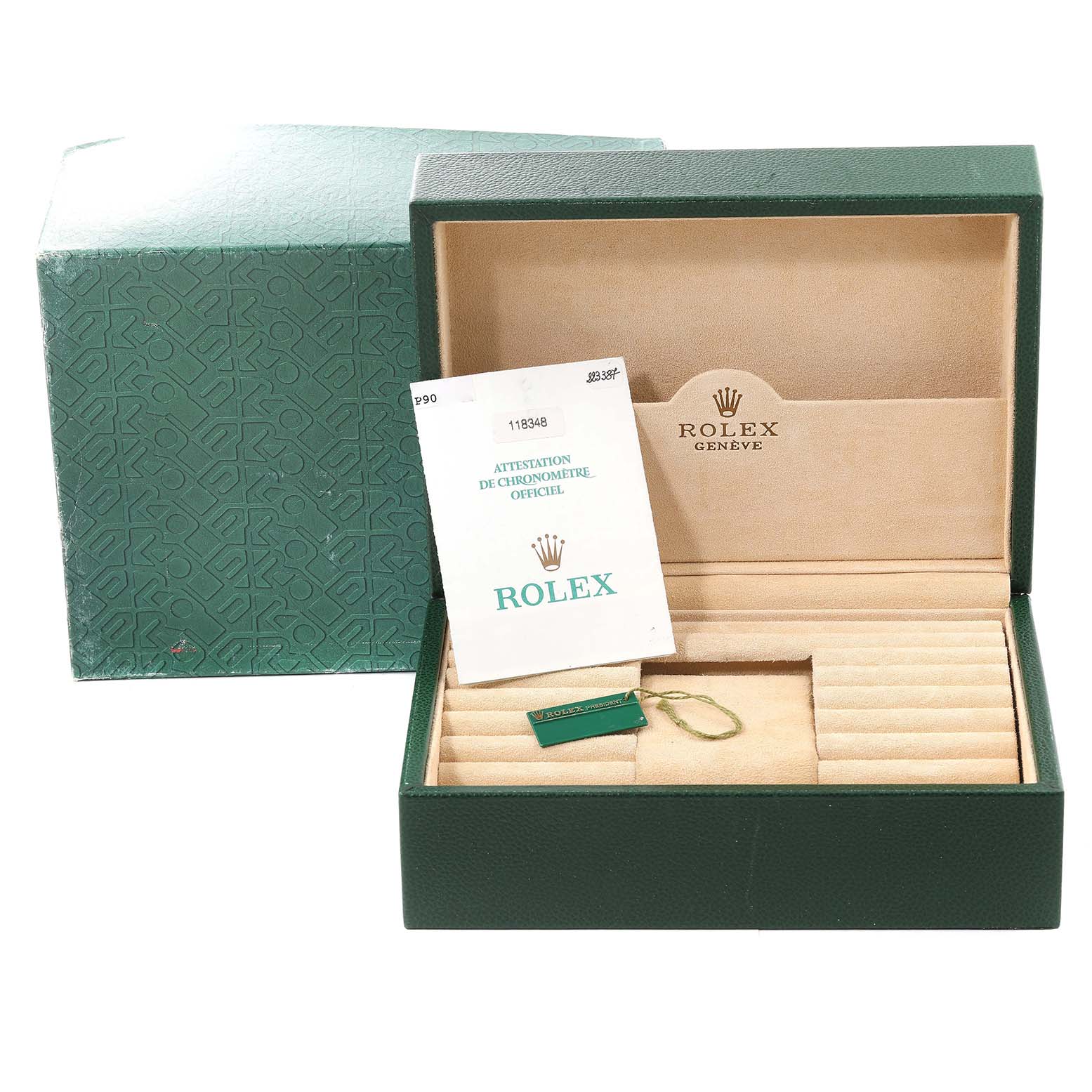 This image shows the open packaging box for the Rolex President 118348 Men's Yellow Gold Mother of Pearl Dial 118348 Men's Yellow Gold Mother of Pearl Dial model watch along with its booklet and tag.