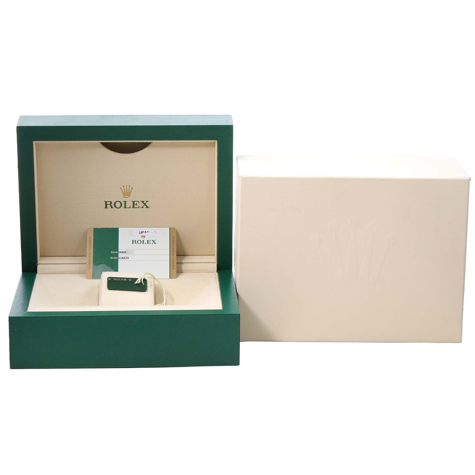 The image shows a Rolex Daytona 116523 Men's Steel and Gold (two tone) Silver Dial watch box and outer packaging with warranty card and tag visible.