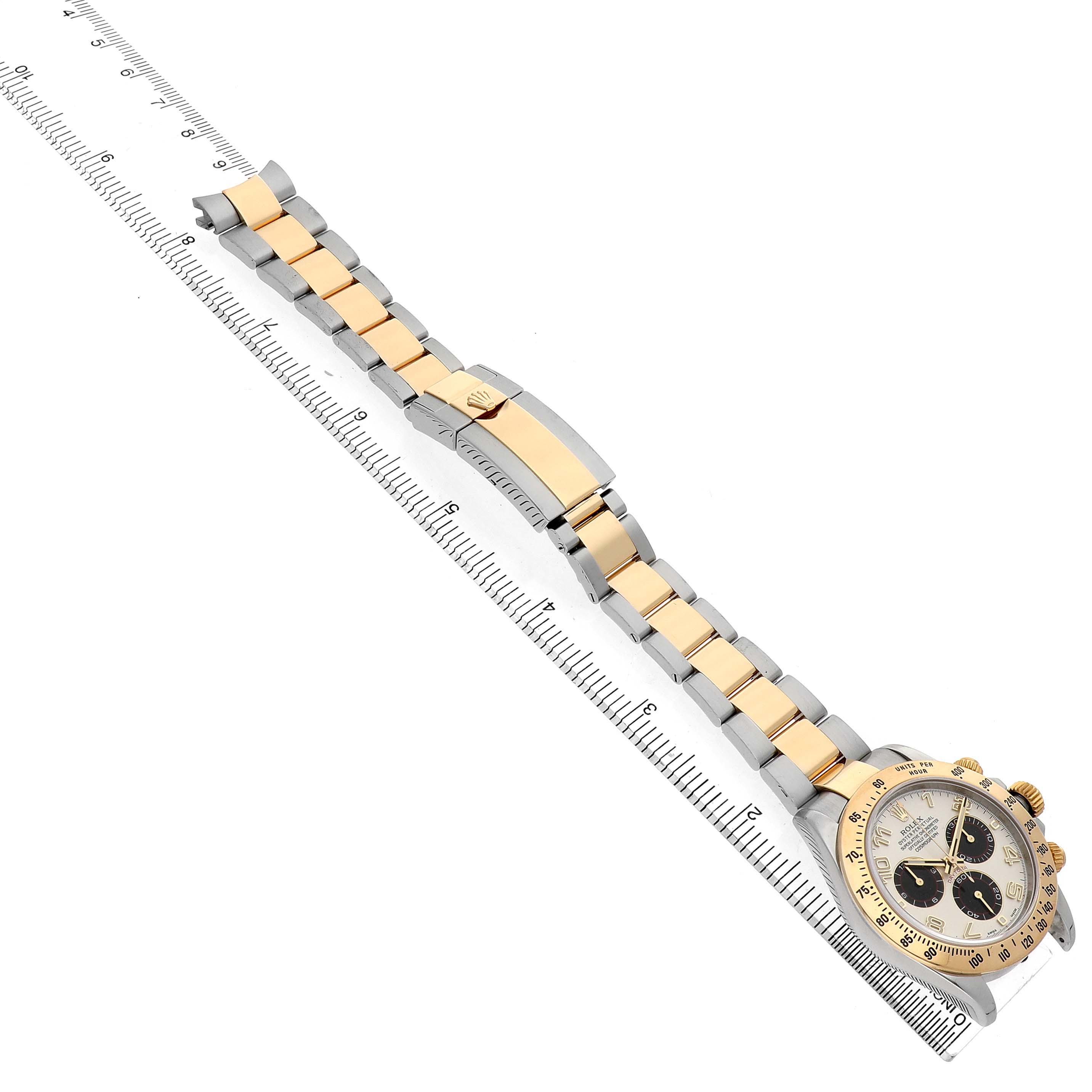 The Rolex Daytona 116523 Men's Steel and Gold (two tone) Silver Dial watch is shown from a top view, highlighting the face, bezel, bracelet, and deployment clasp.
