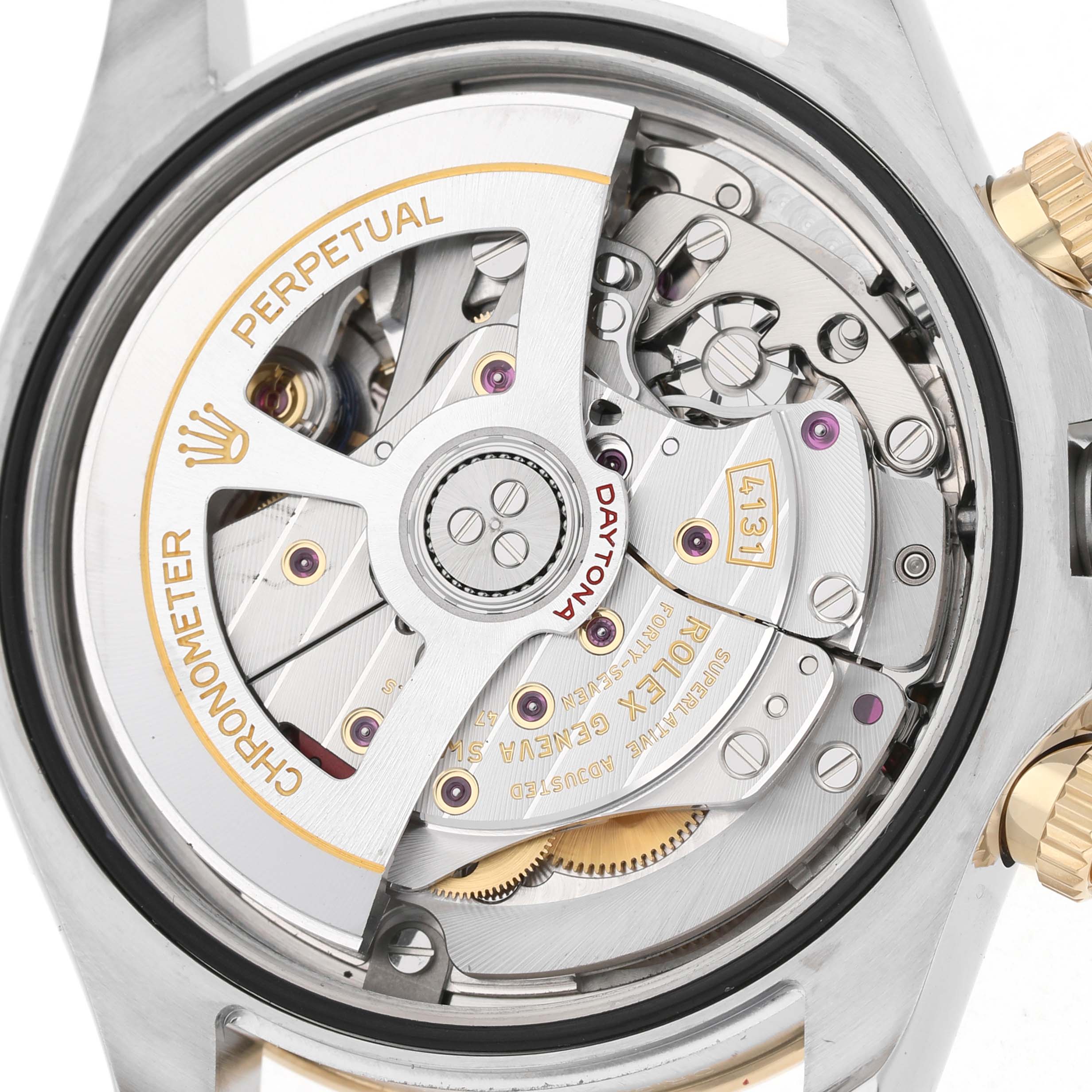 The image shows the movement mechanism of a Rolex Daytona M126503-0001 Men's Steel and Gold (two tone) White Dial watch from a rear angle, highlighting the chronometer and rotor details.