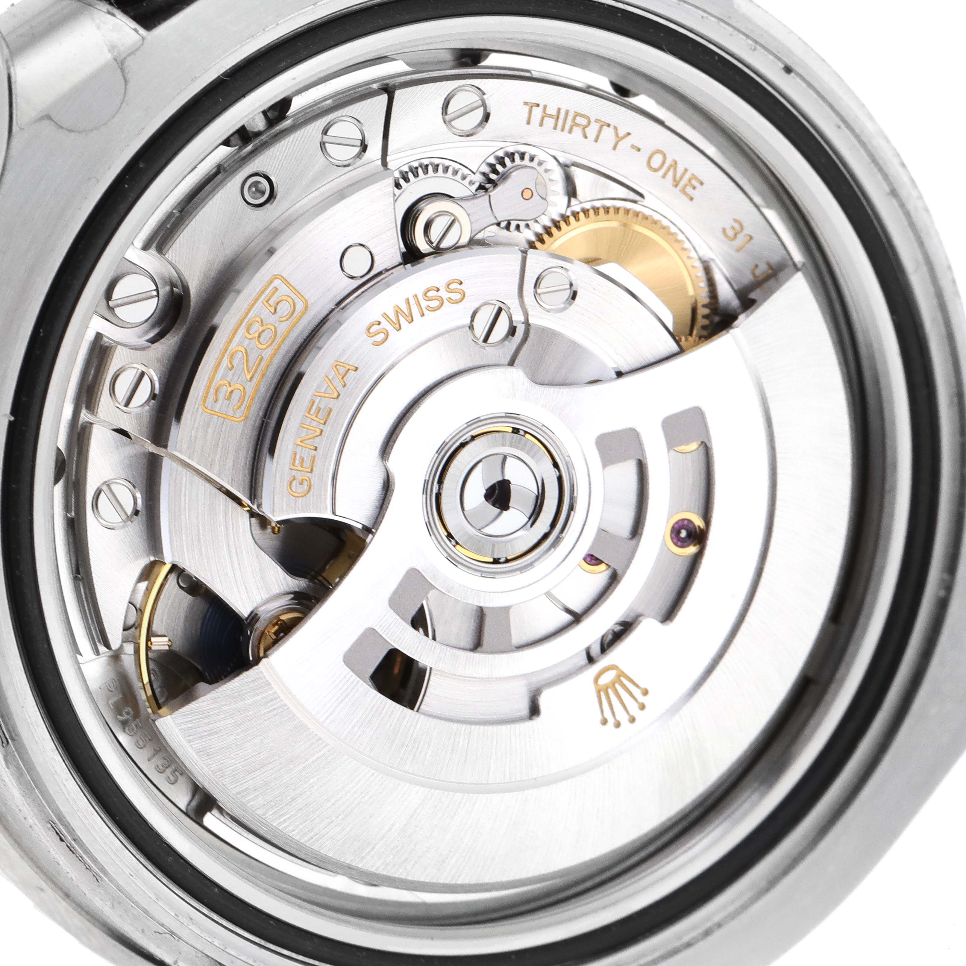 This image shows the intricate internal movement mechanism of a Rolex GMT-Master 126710 Men
s Stainless Steel Black Dial 126710 Men
s Stainless Steel Black Dial watch, specifically the caliber 3285, viewed from the back.