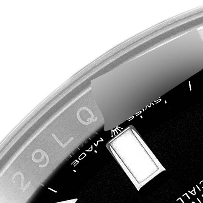 The image shows a close-up of the dial and a portion of the bezel of a Rolex GMT-Master 126710BLRO Men
s Stainless Steel Black Dial 126710BLRO Men
s Stainless Steel Black Dial watch.