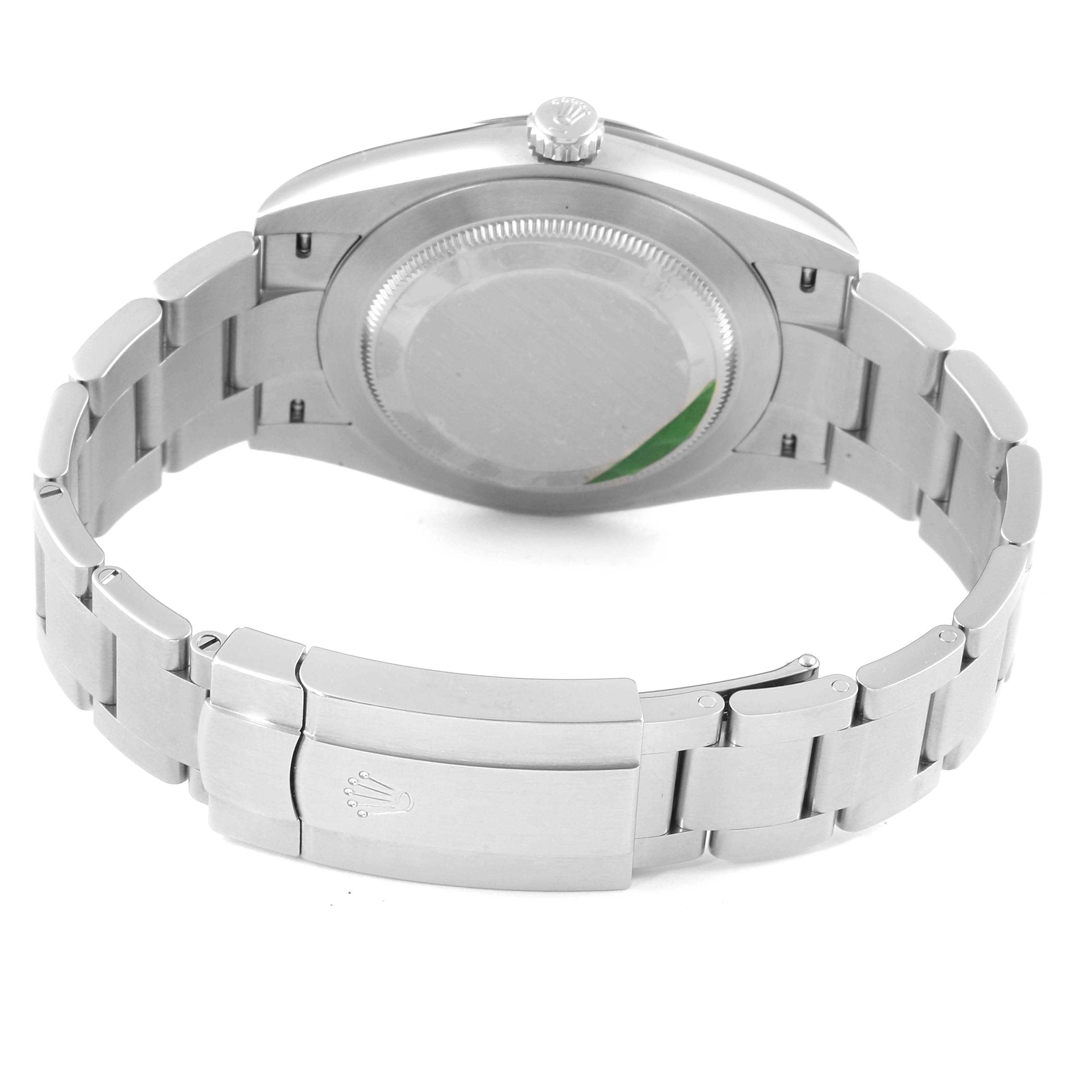 The image shows the back and clasp of a Rolex Oyster Perpetual 124300 Men
s Stainless Steel Blue Dial 124300 Men
s Stainless Steel Blue Dial watch, highlighting the bracelet and case back.