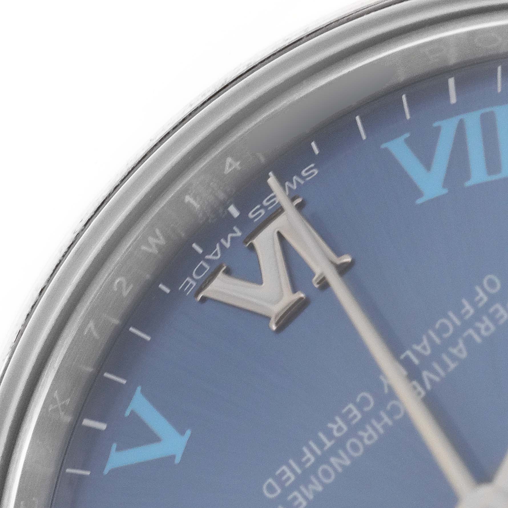 The image shows a close-up of the dial and Roman numerals of a Mid-Size Rolex watch, emphasizing the "VI" and "VII" markers.
