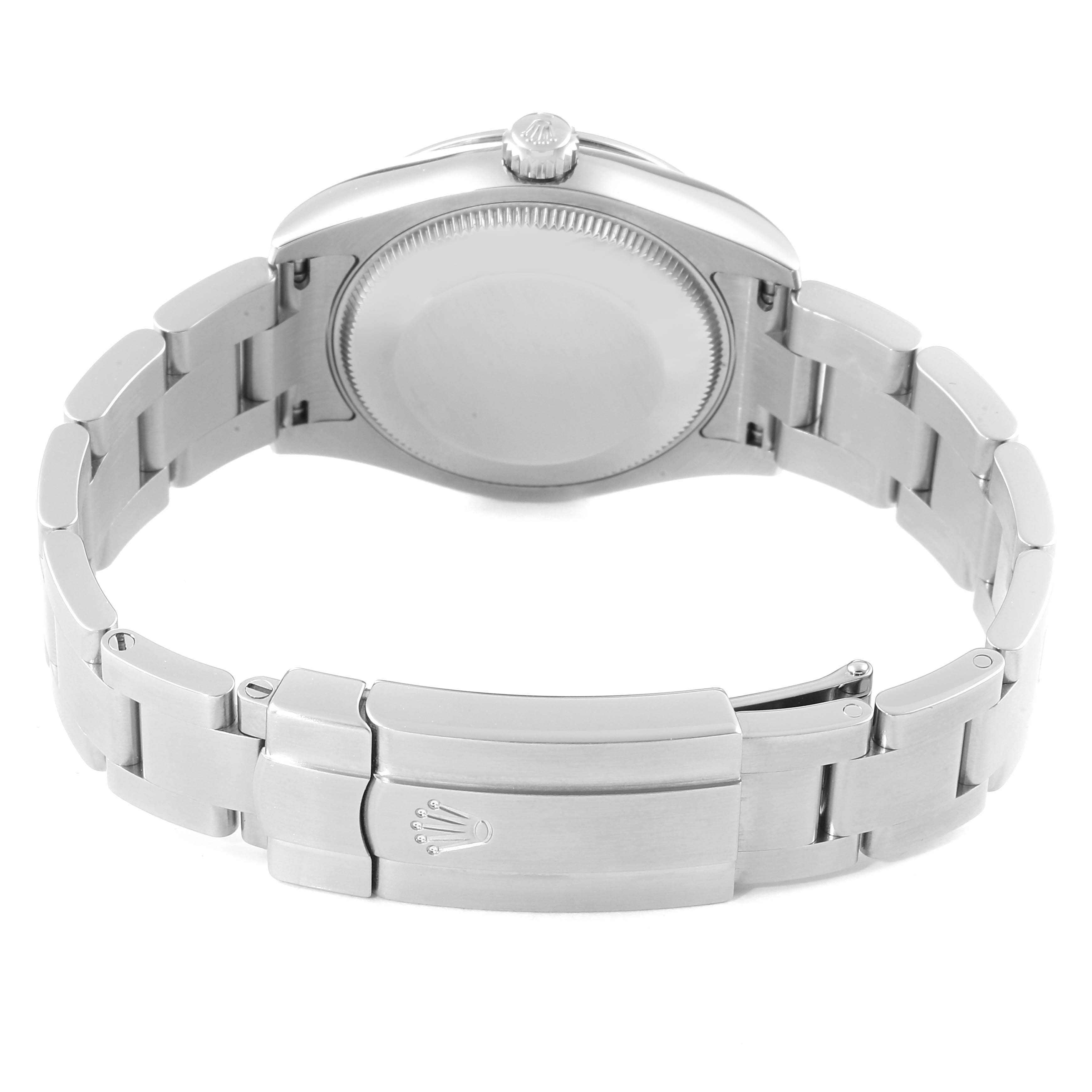 The image shows the back view of the Mid-Size Rolex watch, featuring the case back, bracelet, and clasp.