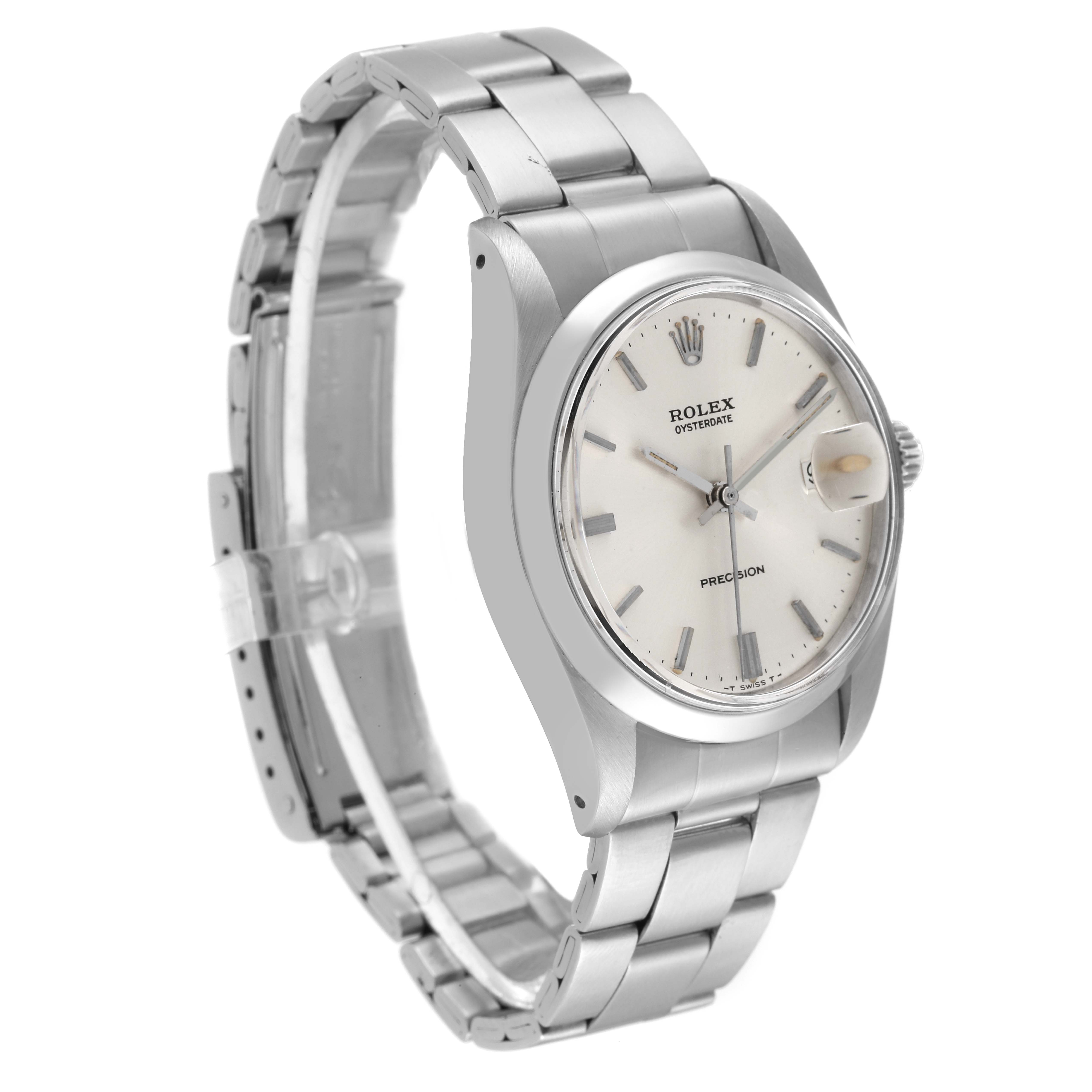 The Vintage Collection Rolex watch is shown at a three-quarter angle highlighting its face, bracelet, and crown.