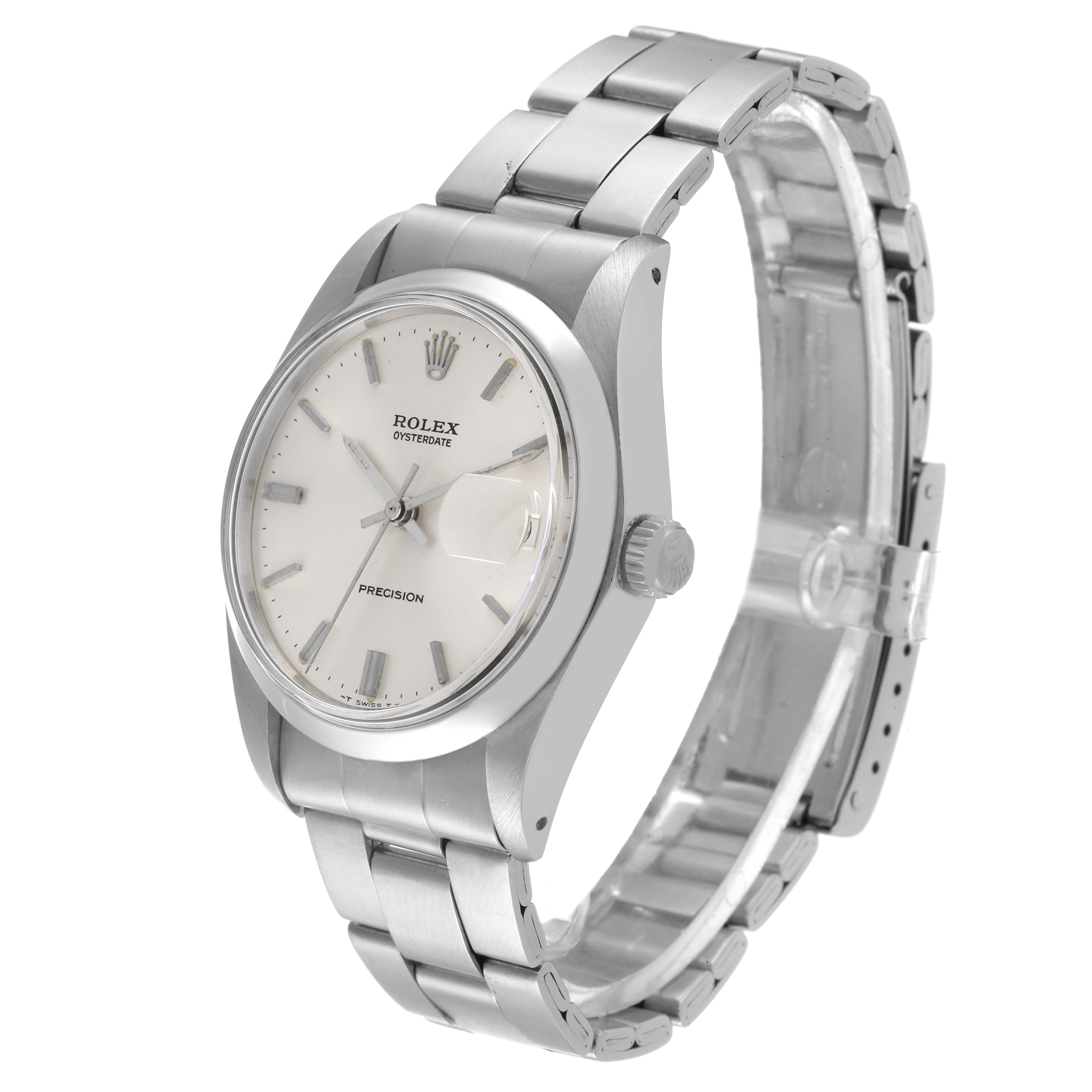 This image shows a side angle view of the Rolex Vintage Collection 6694 Men's Stainless Steel Silver Dial 6694 Men's Stainless Steel Silver Dial watch, highlighting its face, crown, and bracelet.