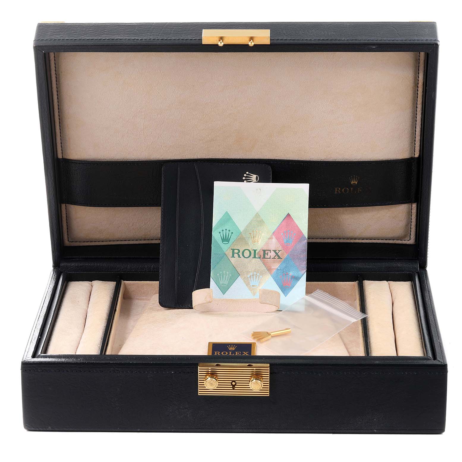 This image shows the storage box and accessories for a Rolex Pearlmaster 80299 Women's White Gold Mother of Pearl Dial 80299 Women's White Gold Mother of Pearl Dial watch, including documentation and a tool.