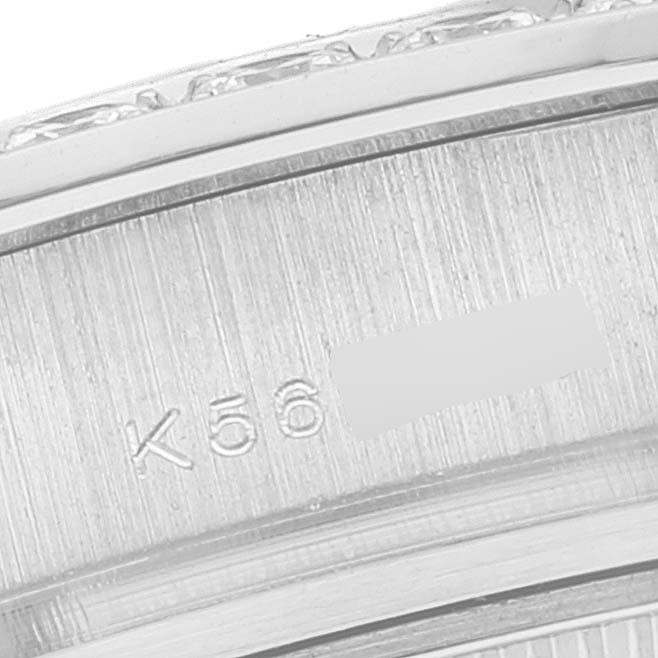 The image shows a close-up of the bezel and part of the case back of a Rolex Pearlmaster 80299 Women's White Gold Mother of Pearl Dial 80299 Women's White Gold Mother of Pearl Dial watch.