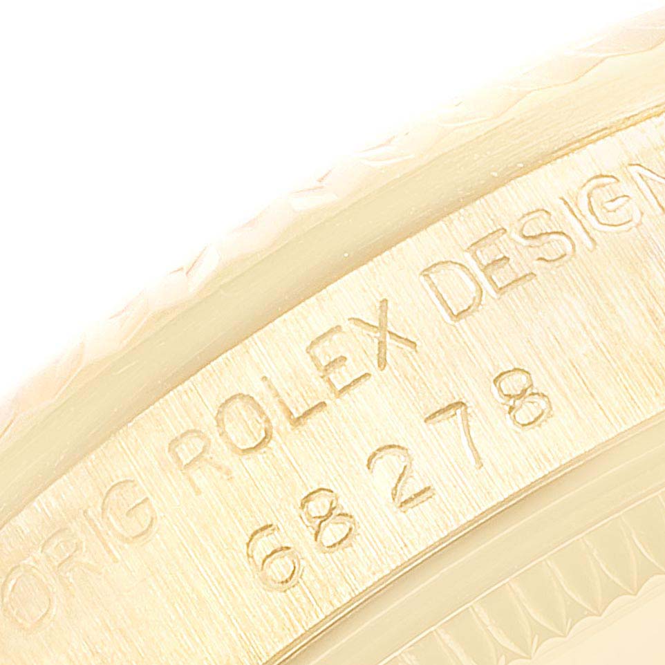 This close-up image shows the engraved case back of a President model by Rolex.
