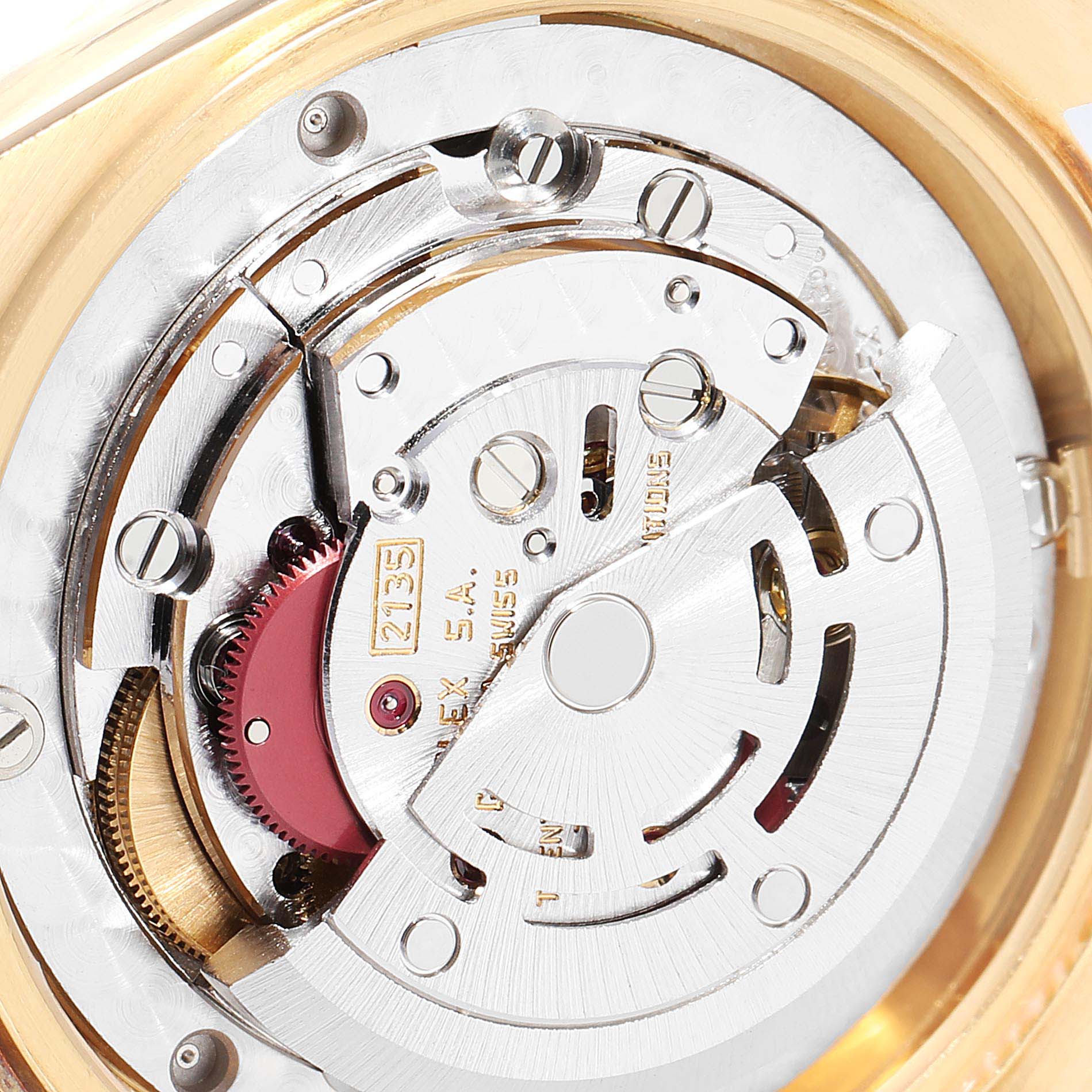 This image shows the inner mechanical movement of a Rolex President 68278 Women
s Yellow Gold Champagne Dial 68278 Women
s Yellow Gold Champagne Dial model watch from a close-up angle.