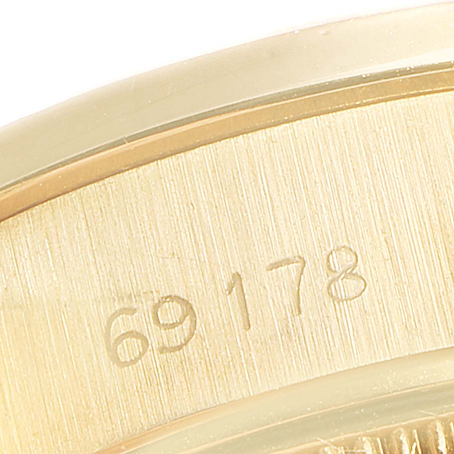 This image shows a close-up of the case back of a Rolex President 69178 Women
s Yellow Gold Champagne Dial 69178 Women
s Yellow Gold Champagne Dial model, highlighting the model number 69178.