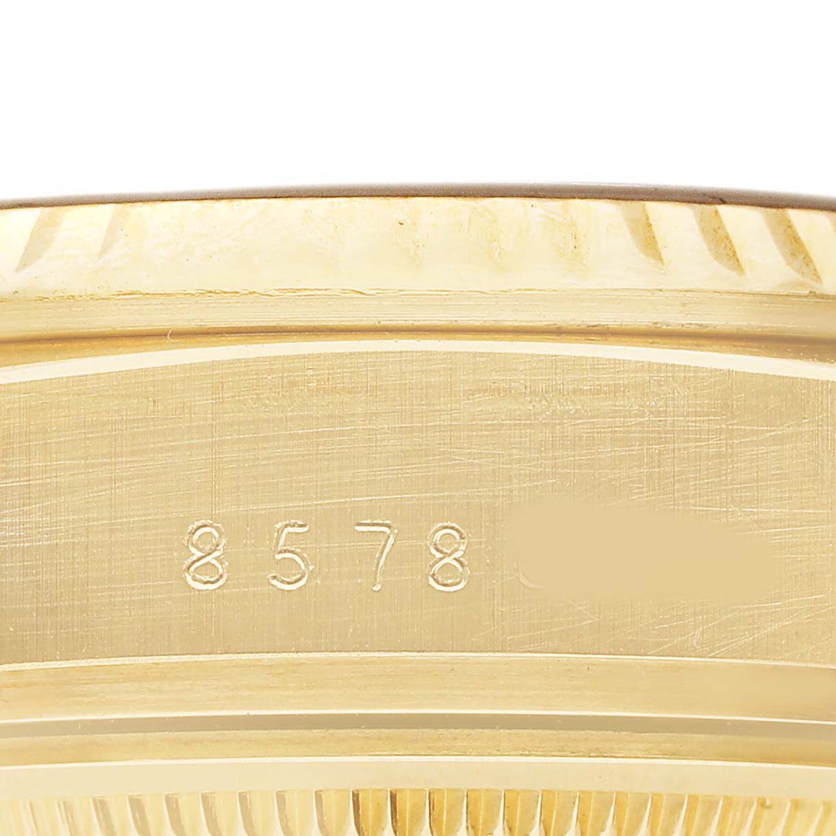 The image shows a close-up of the side profile of a Rolex President 18038 Men's Yellow Gold Champagne Dial watch, highlighting the model number engraved on the case.