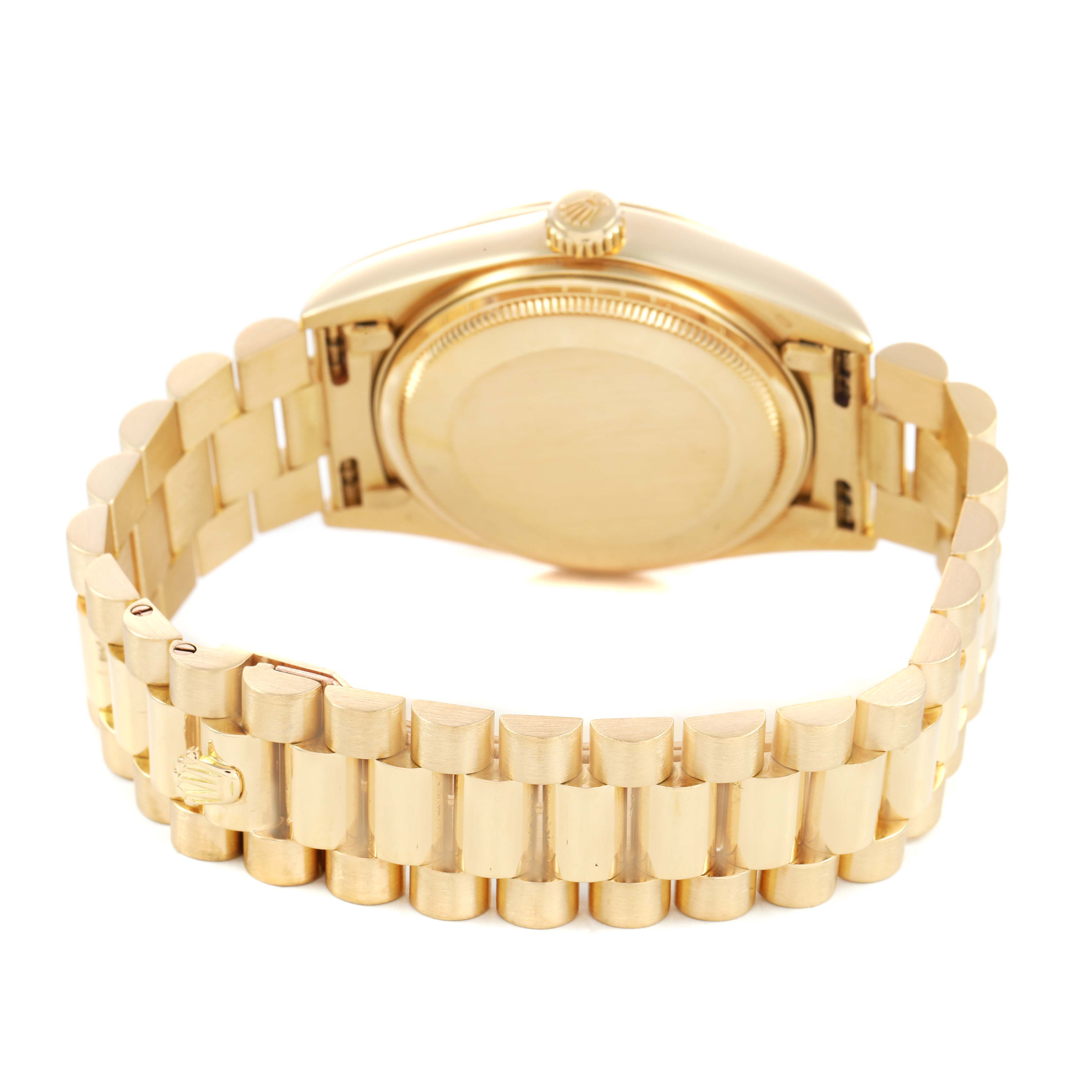 The image shows the back of a Rolex President 18038 Men's Yellow Gold Champagne Dial watch, featuring the bracelet and case back from a side angle.