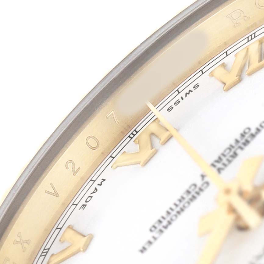 The image shows a close-up of the dial edge and Roman numerals on a Rolex President 218238 Men's Yellow Gold White Dial model watch.