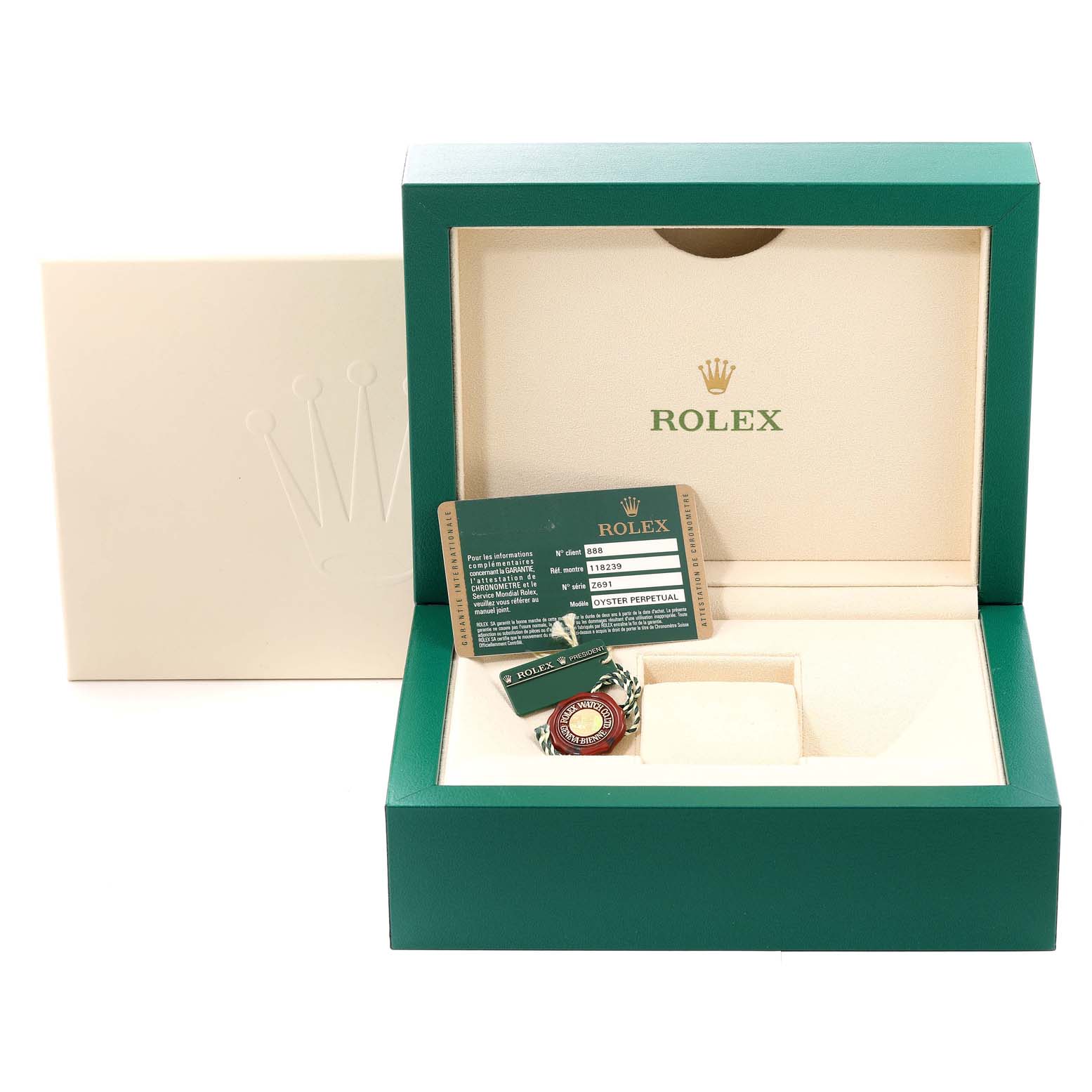 This image shows the packaging, warranty card, and tag of a Rolex President 118239 Men's White Gold Silver Dial 118239 Men's White Gold Silver Dial model watch.