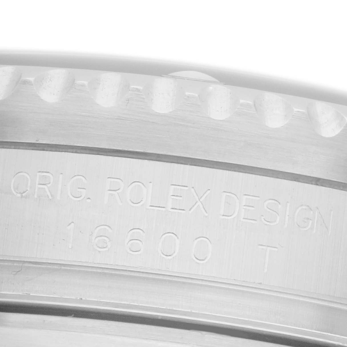 The image shows a close-up of the side of the Rolex Sea-Dweller 16600 Men's Stainless Steel Black Dial, highlighting its engraved design markings and model number.