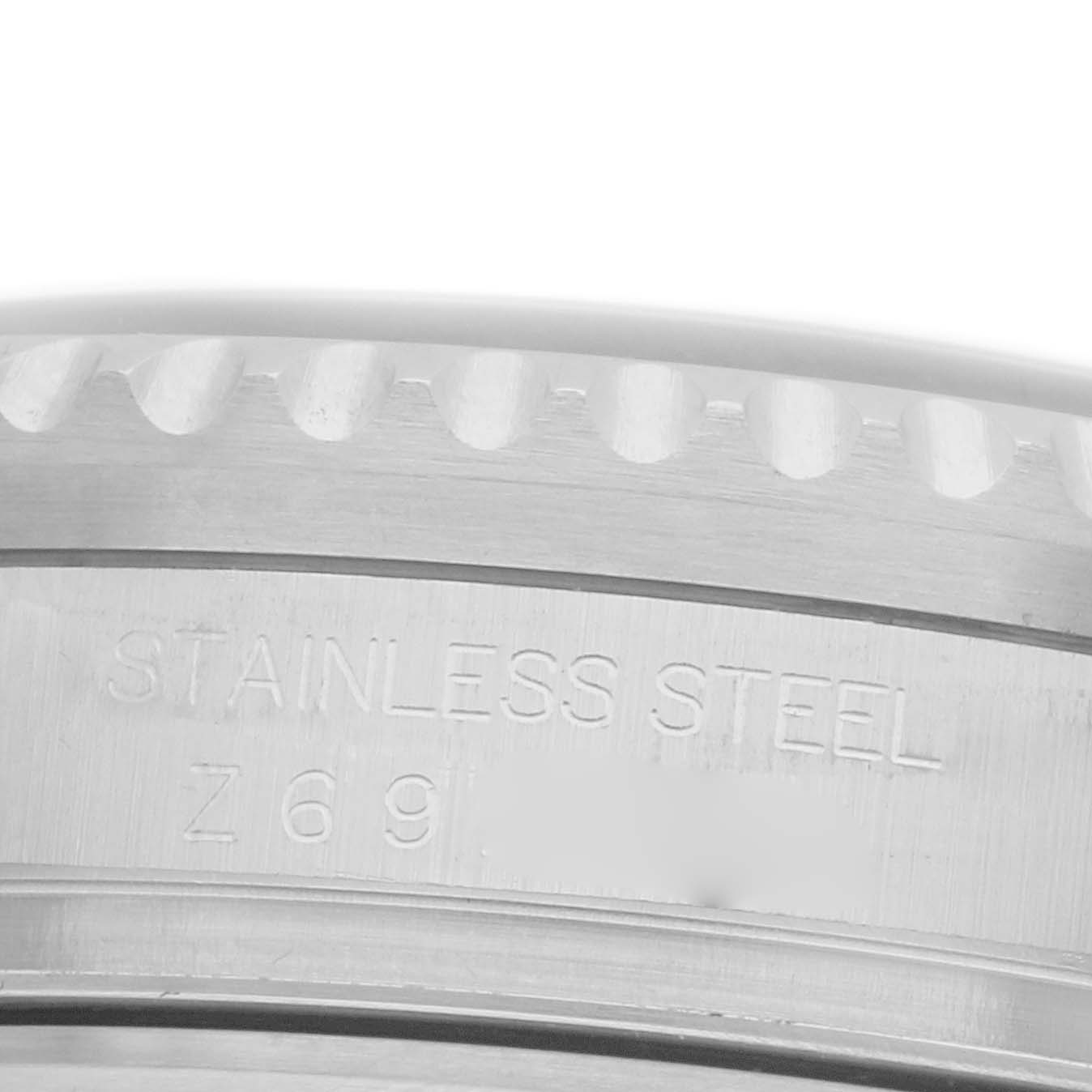 The image shows a close-up of the side engraving on a Rolex Sea-Dweller 16600 Men's Stainless Steel Black Dial's stainless steel case.