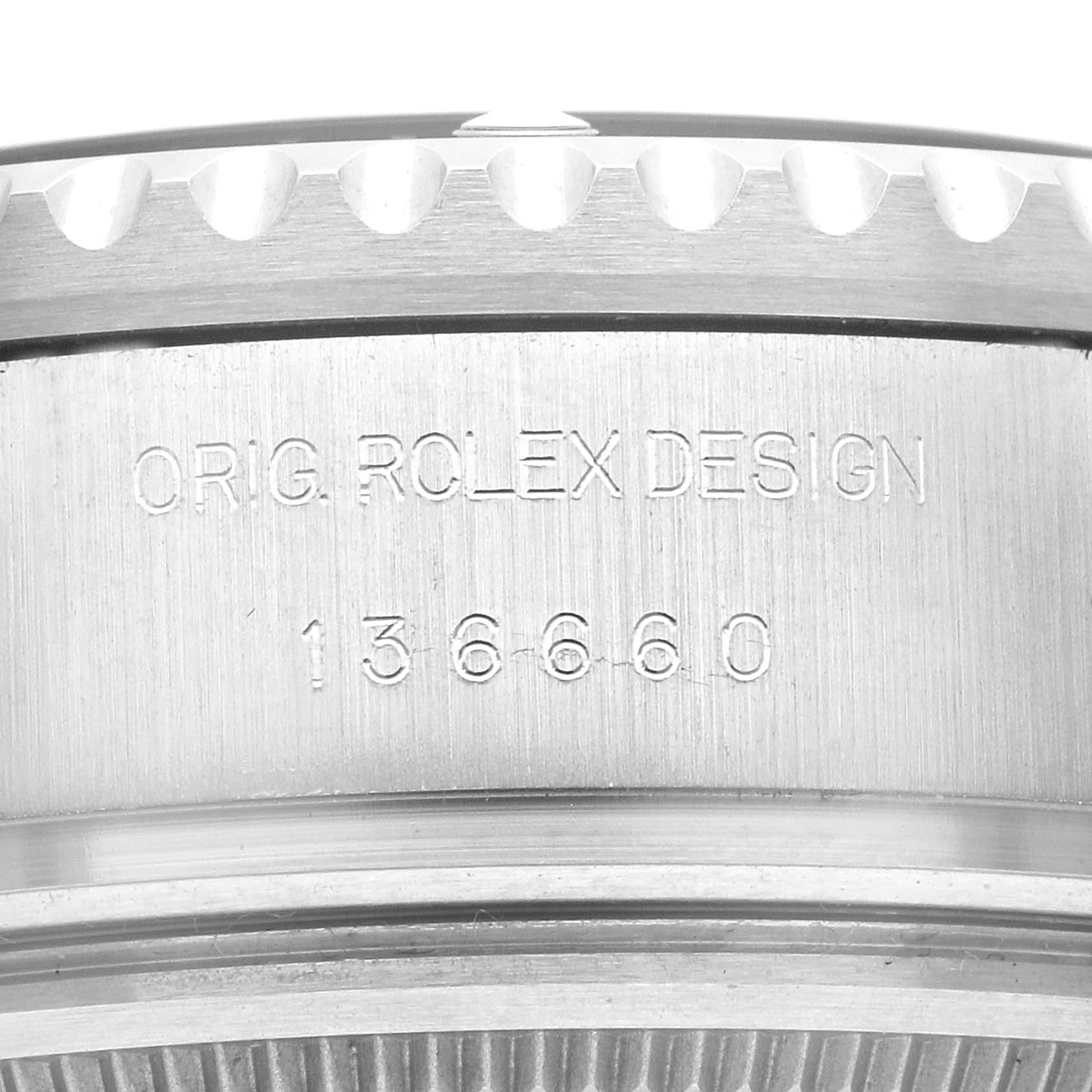 The image shows a close-up of the side of the Rolex Sea-Dweller 136660 Men's Stainless Steel Black Dial 136660 Men's Stainless Steel Black Dial watch case, highlighting the model number and engraved text.