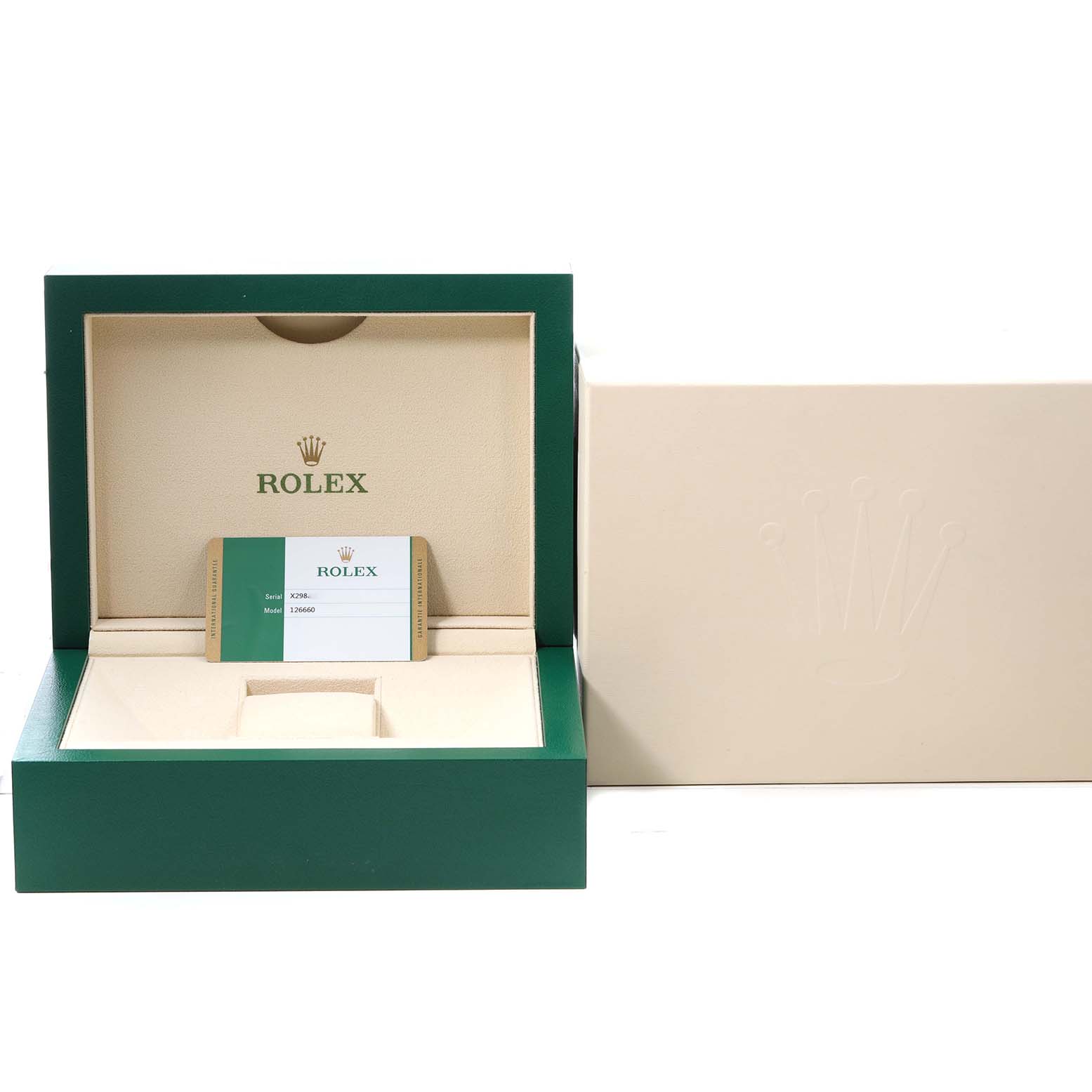 The image shows an open green box for a Rolex Sea-Dweller 126660 Men's Stainless Steel Blue Dial, displaying its inner lining and a warranty card.